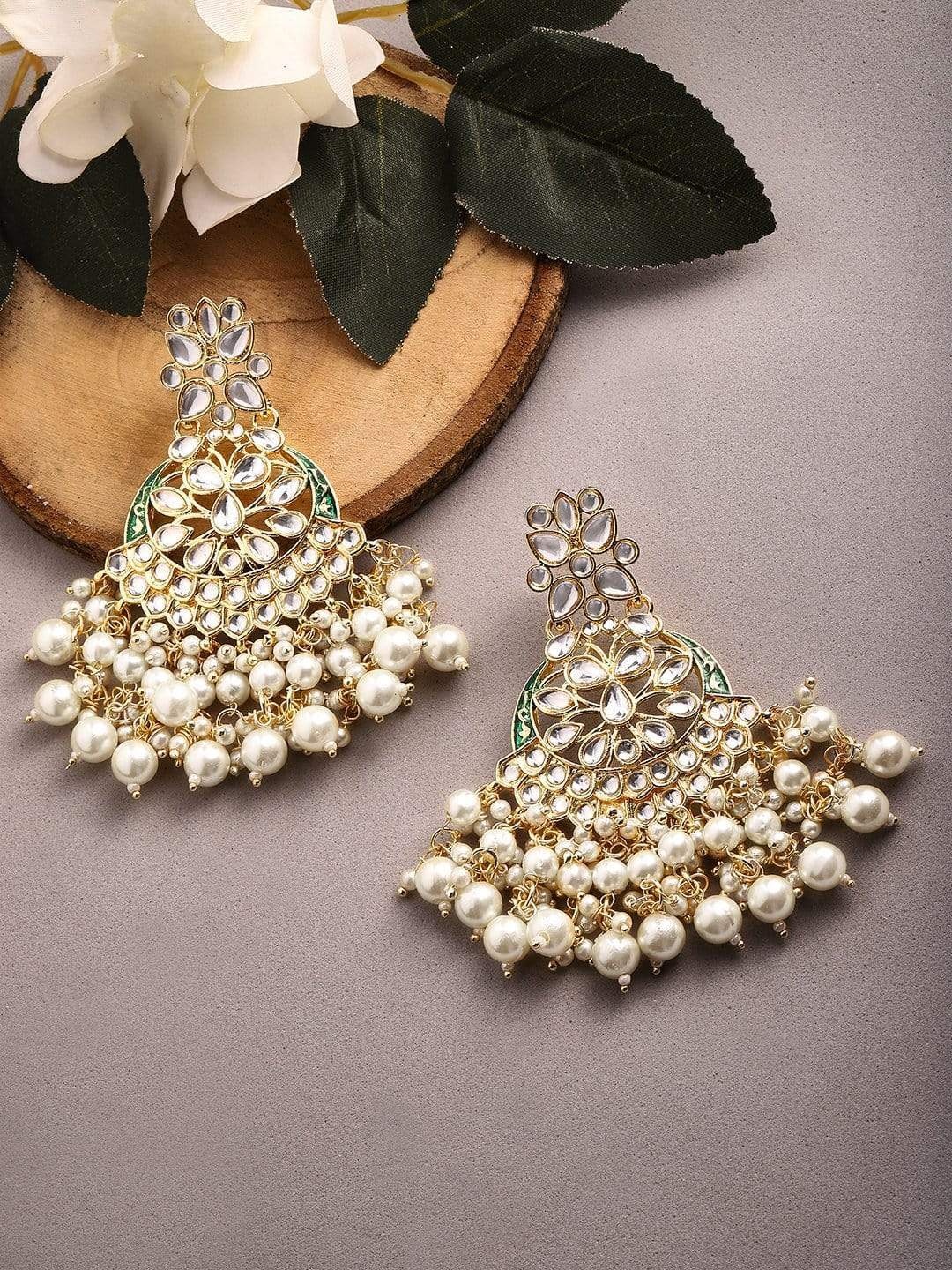 Rubans Off-White 22K Gold-Plated Handcrafted Stone Studded Crescent Shaped Chandbalis
Rubans Off-White 22K Gold-Plated Handcrafted Stone Studded Crescent Shaped Chandbalis