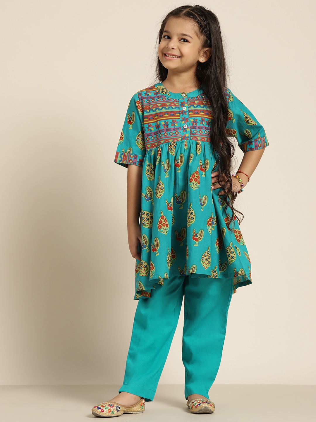 Sangria Girls Turquoise Blue & Orange Ethnic Motifs Print Cotton A-Line Kurta & Trousers
Sangria Girls Turquoise Blue & Orange Ethnic Motifs Print Cotton A-Line Kurta & Trousers