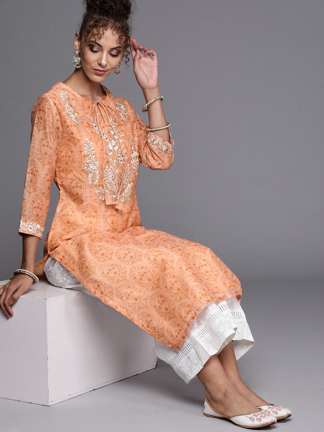 Inddus Women Peach-Coloured Ethnic Motifs Print Thread Work Straight Kurta with Palazzos
Inddus Women Peach-Coloured Ethnic Motifs Print Thread Work Straight Kurta with Palazzos