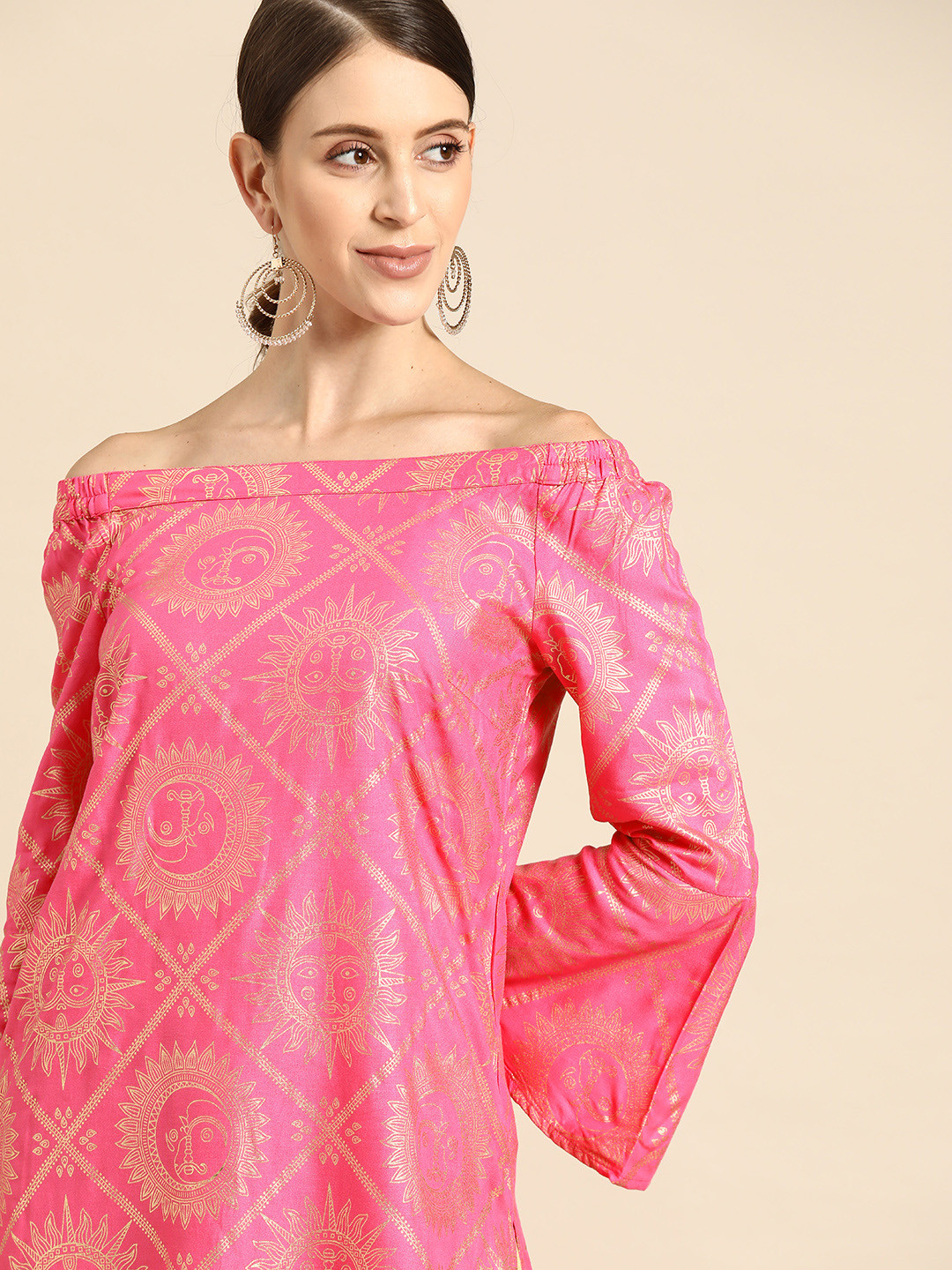 Anouk Women Pink & Golden Ethnic Motifs Printed Off-Shoulder Bell Sleeves Kurta
Anouk Women Pink & Golden Ethnic Motifs Printed Off-Shoulder Bell Sleeves Kurta
