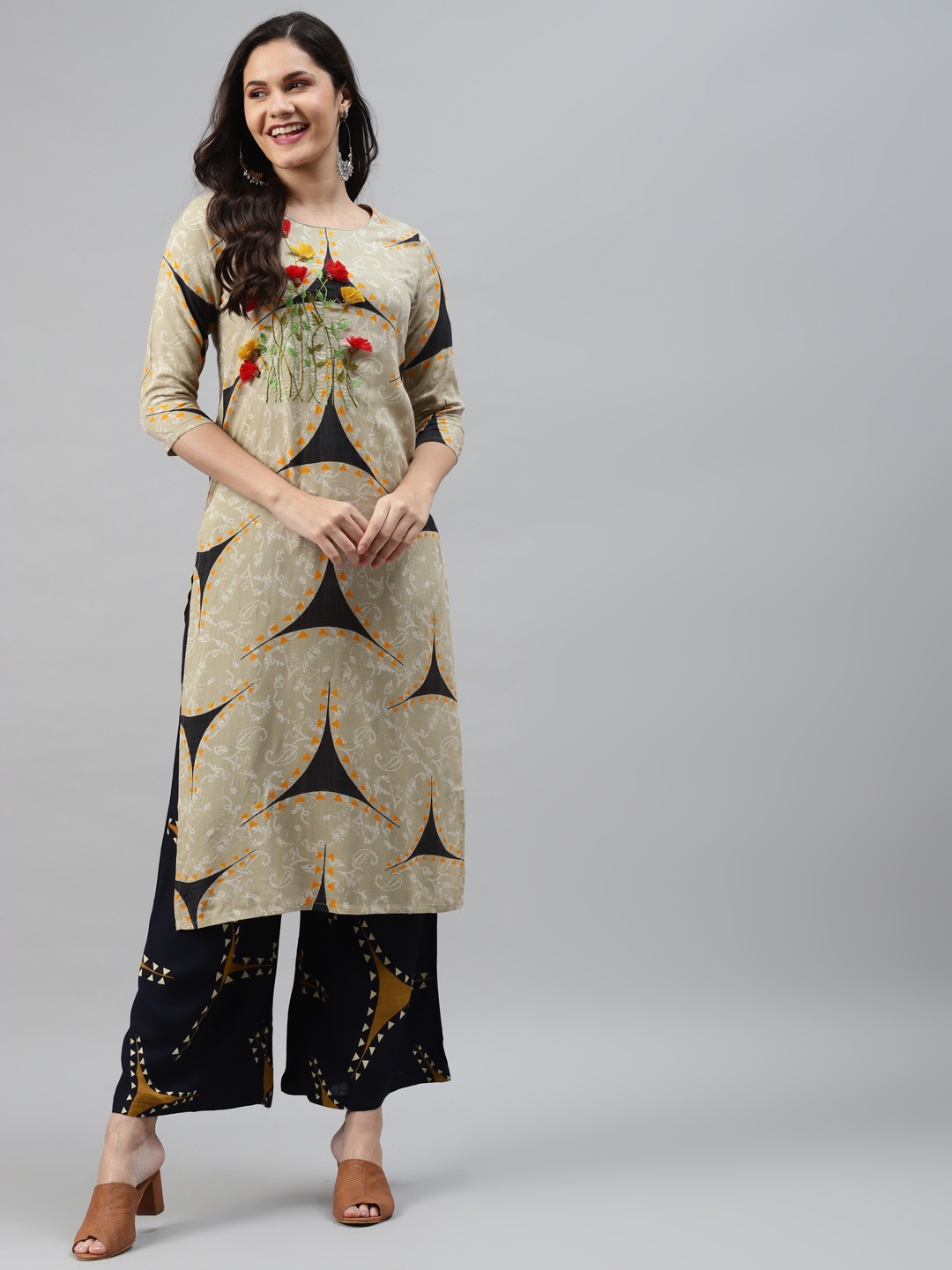 Nehamta Women Beige & White Paisley Printed Thread Work Straight Kurta with Palazzos
Nehamta Women Beige & White Paisley Printed Thread Work Straight Kurta with Palazzos