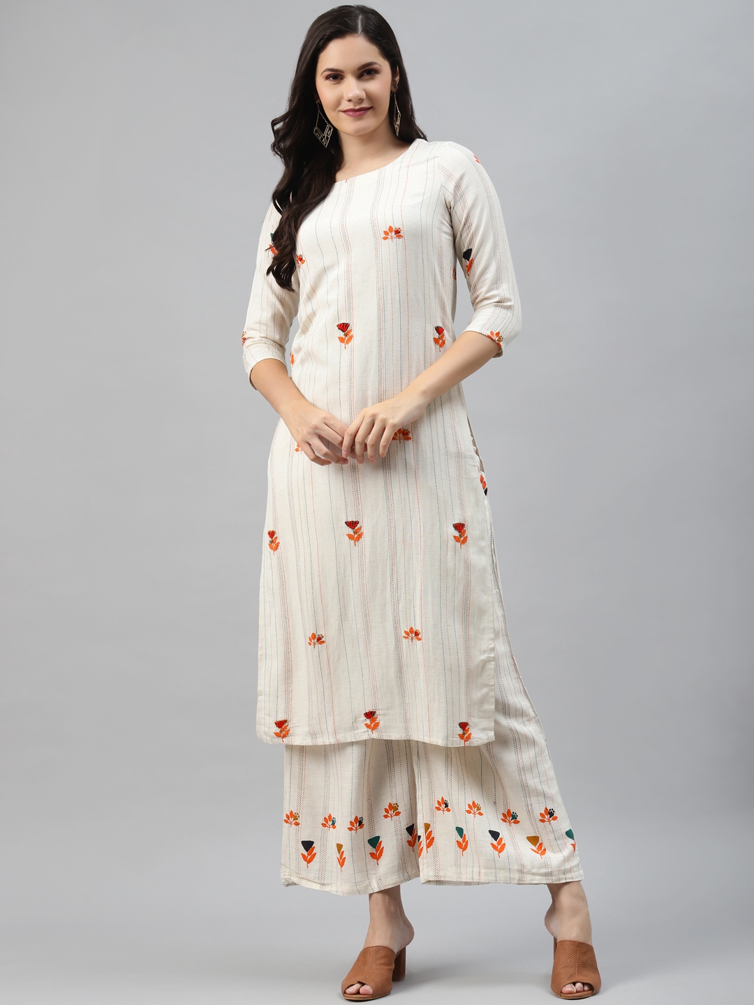 Nehamta Women Off White & Orange Pin Striped Thread Work Straight Kurta with Palazzos
Nehamta Women Off White & Orange Pin Striped Thread Work Straight Kurta with Palazzos