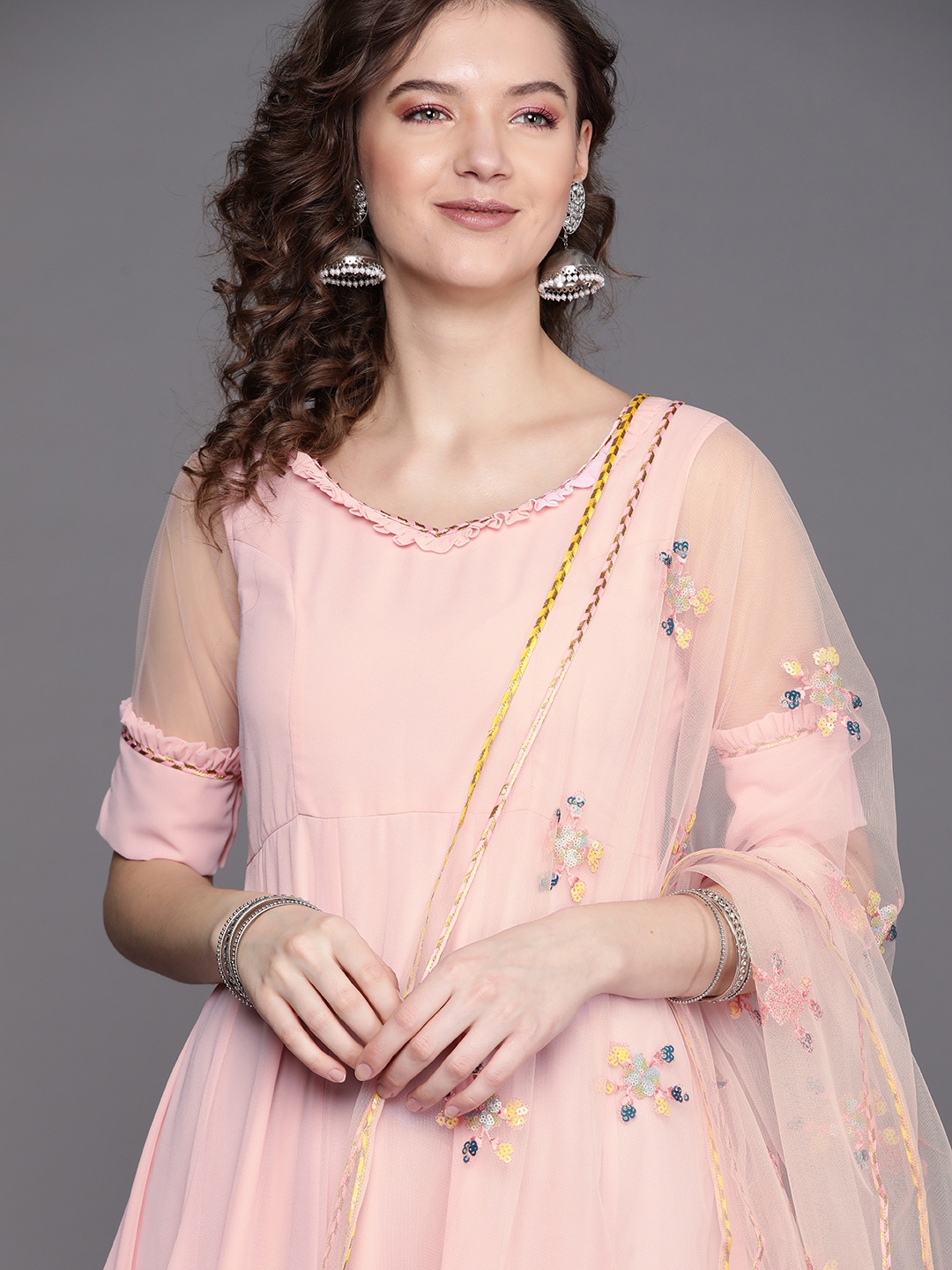 Inddus Women Pink Solid Frilled Georgette Anarkali Kurta with Floral Embroidered Dupatta
Inddus Women Pink Solid Frilled Georgette Anarkali Kurta with Floral Embroidered Dupatta