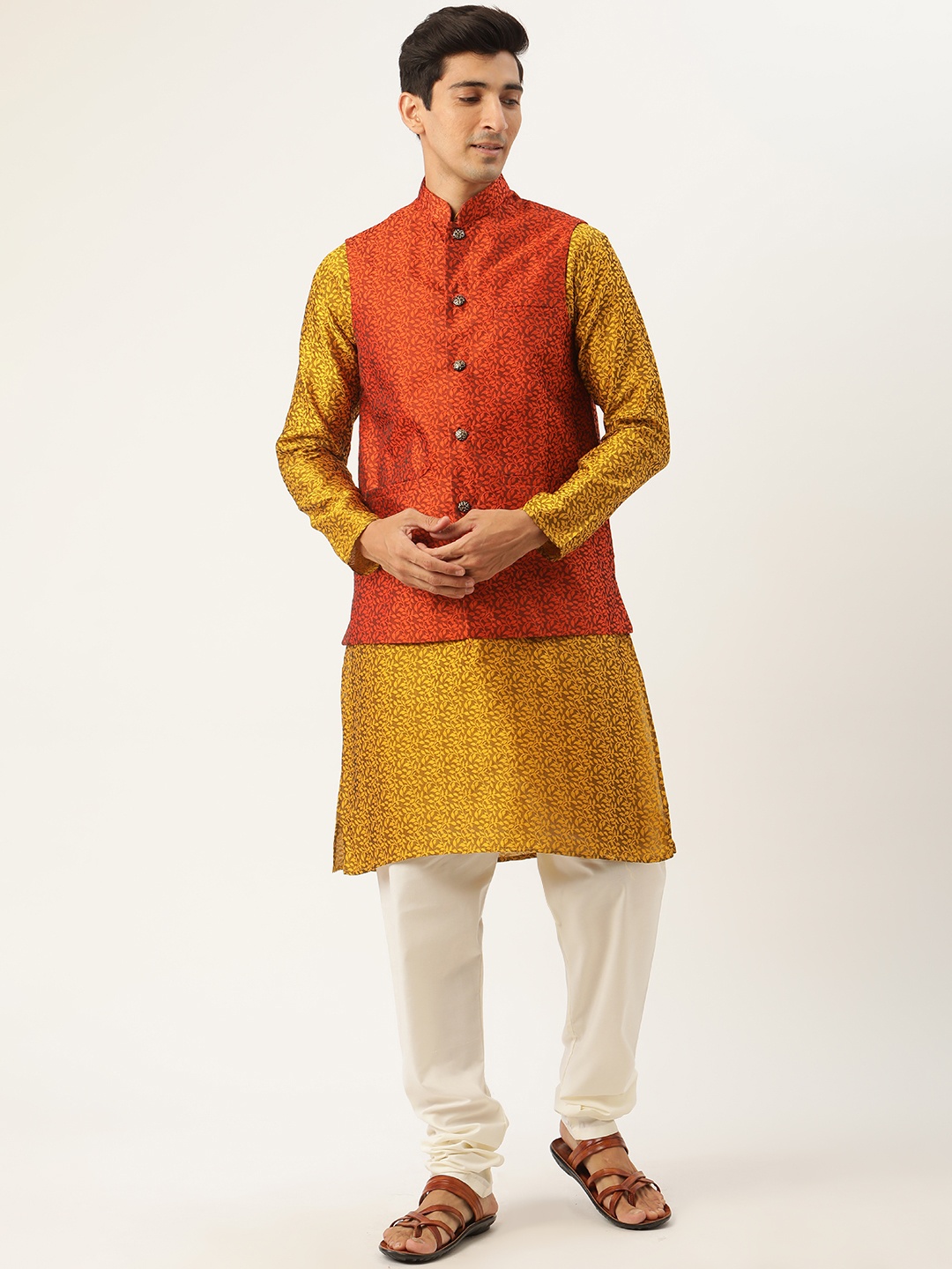 SOJANYA Men Mustard Yellow & Orange Ethnic Motifs Kurta with Churidar & Nehru Jacket
SOJANYA Men Mustard Yellow & Orange Ethnic Motifs Kurta with Churidar & Nehru Jacket