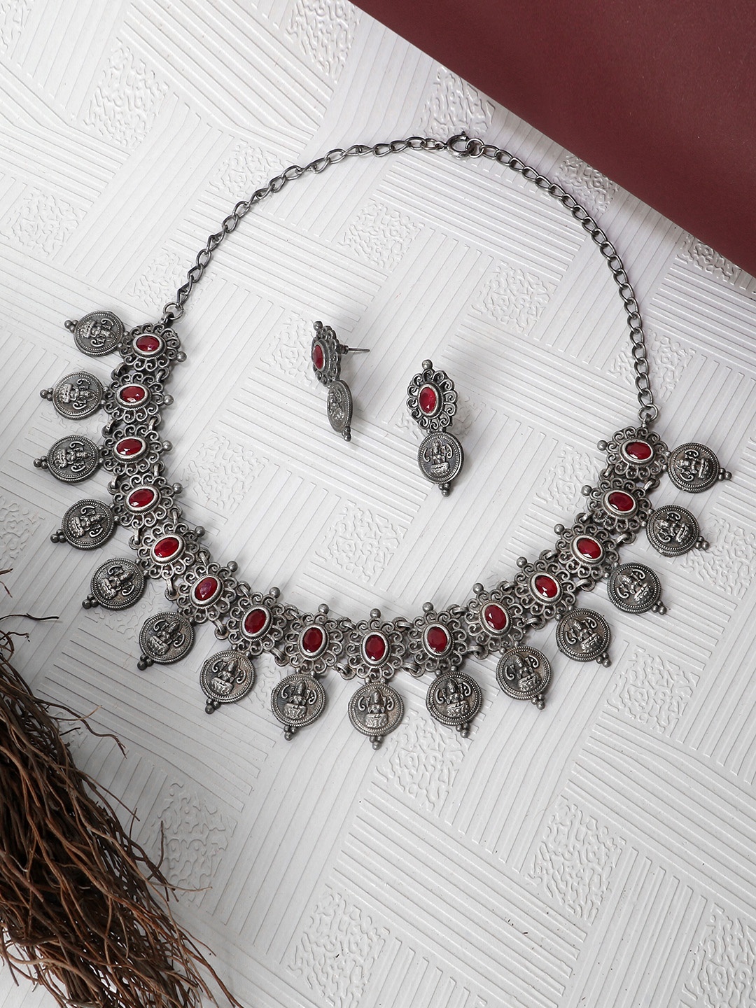 Adwitiya Collection Oxidized Silver-Plated Maroon Ruby-Studded Handcrafted Temple Jewellery Set
Adwitiya Collection Oxidized Silver-Plated Maroon Ruby-Studded Handcrafted Temple Jewellery Set