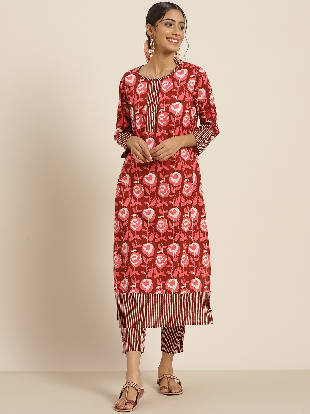 Sangria Women Pink & Rust Brown Ethnic Motifs Printed Pure Cotton Kurta with Trousers
Sangria Women Pink & Rust Brown Ethnic Motifs Printed Pure Cotton Kurta with Trousers