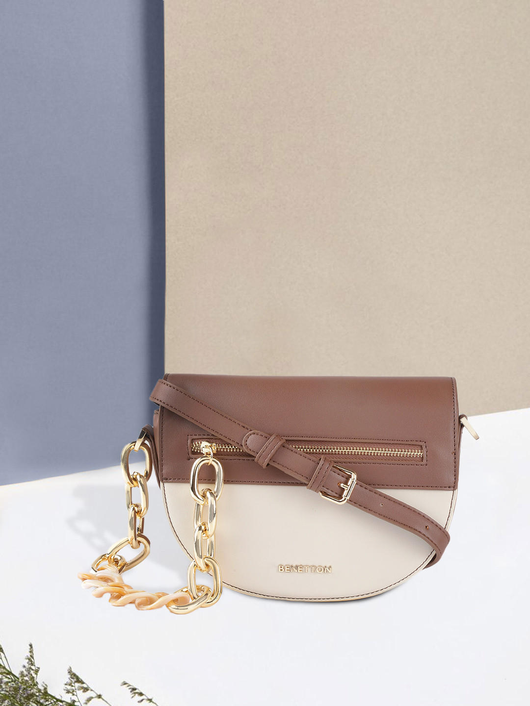 United Colors of Benetton Off-White & Brown Colourblocked Structured Sling Bag 
United Colors of Benetton Off-White & Brown Colourblocked Structured Sling Bag