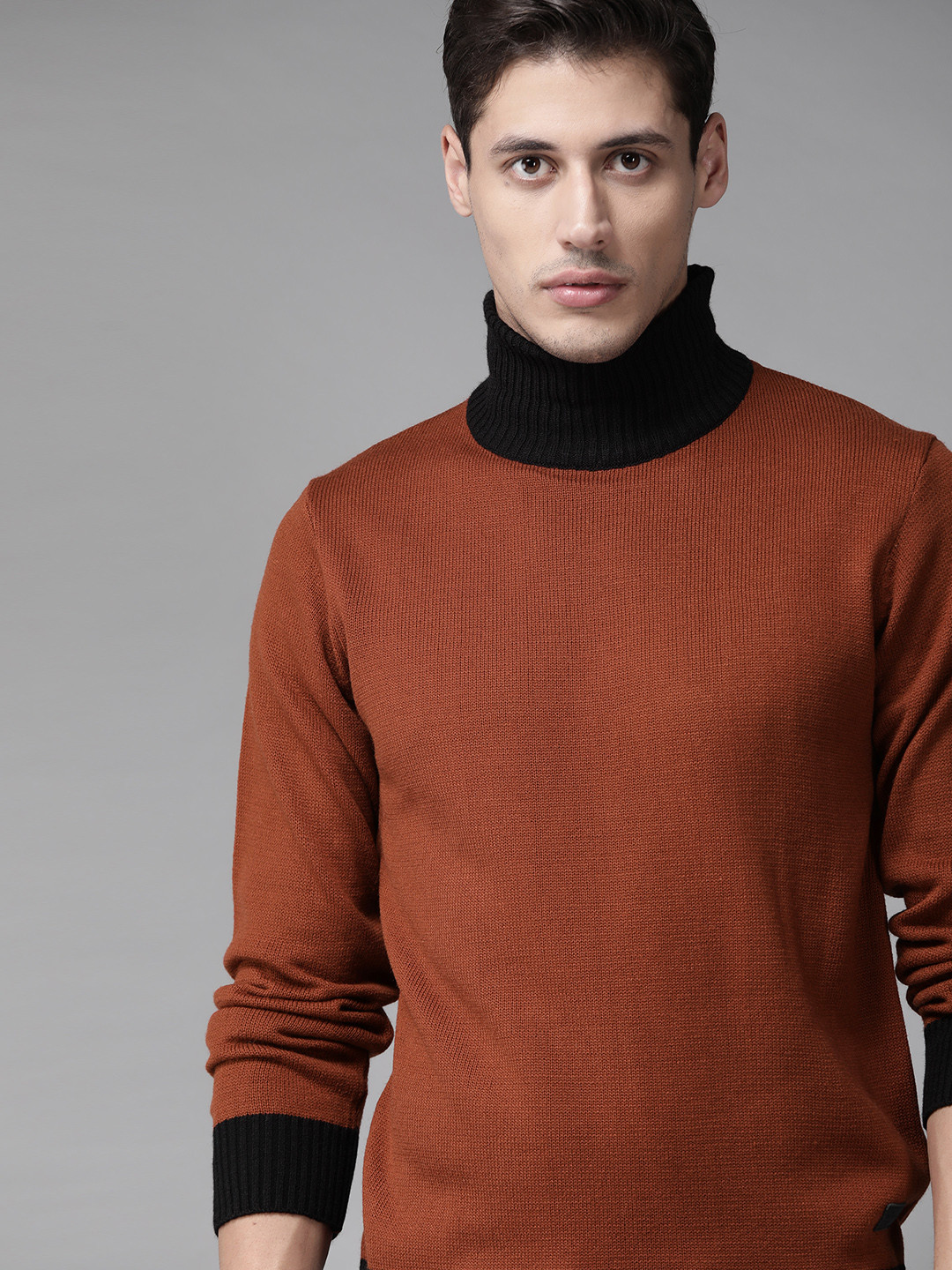 Roadster Men Rust Orange & Black Solid Turtle Neck Pullover
Roadster Men Rust Orange & Black Solid Turtle Neck Pullover