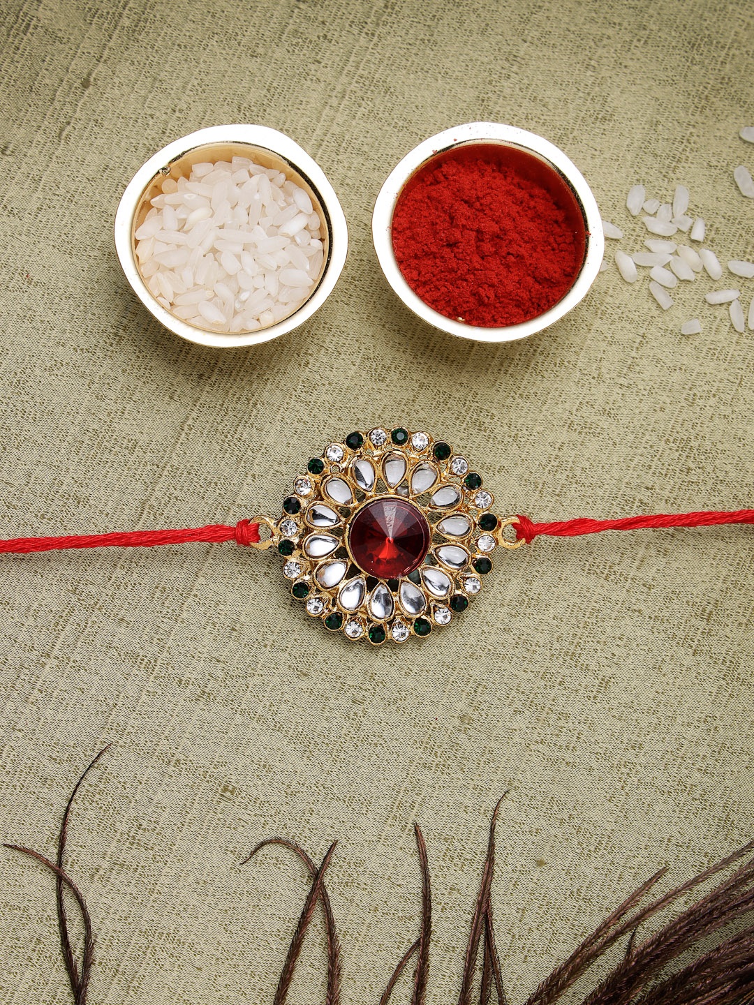 Sukkhi Rakhi Men Gold-Plated Red & White Stone-Studded Rakhi With Roli Chawal & Raksha Bandhan Greeting Card
Sukkhi Rakhi Men Gold-Plated Red & White Stone-Studded Rakhi With Roli Chawal & Raksha Bandhan Greeting Card