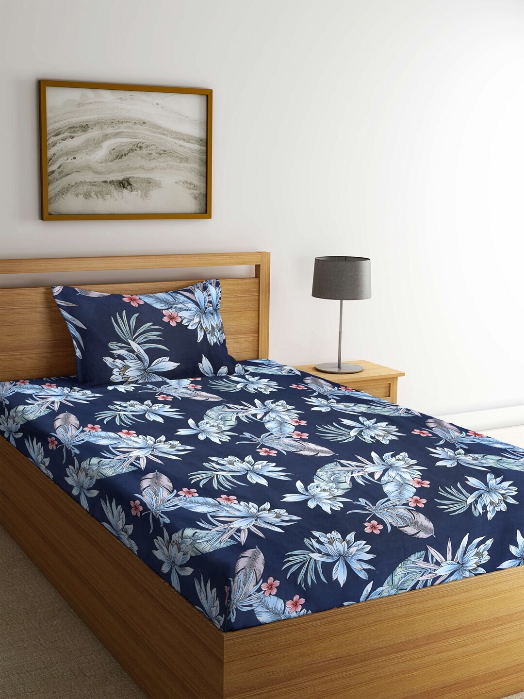 KLOTTHE Navy Blue & Pink Floral 210 TC Polycotton 1 Single Bedsheet with 1 Pillow Covers
KLOTTHE Navy Blue & Pink Floral 210 TC Polycotton 1 Single Bedsheet with 1 Pillow Covers
