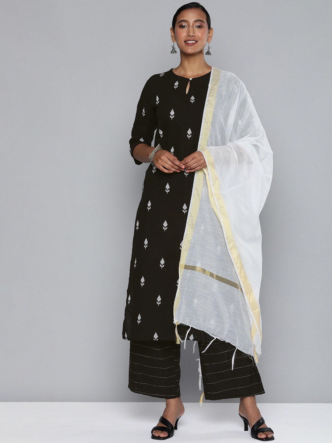 Vishudh Women Black Ethnic Motifs Embroidered Cotton Kurta with Palazzos & With Dupatta
Vishudh Women Black Ethnic Motifs Embroidered Cotton Kurta with Palazzos & With Dupatta
