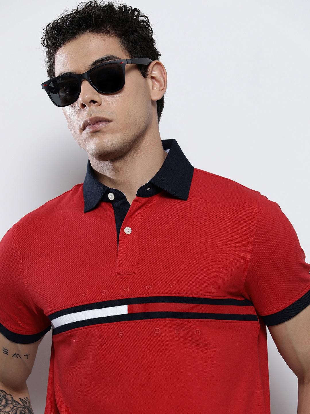 Tommy Hilfiger Men Red & Multicoloured Brand Logo Printed Polo Collar Slim Fit T-shirt
Tommy Hilfiger Men Red & Multicoloured Brand Logo Printed Polo Collar Slim Fit T-shirt