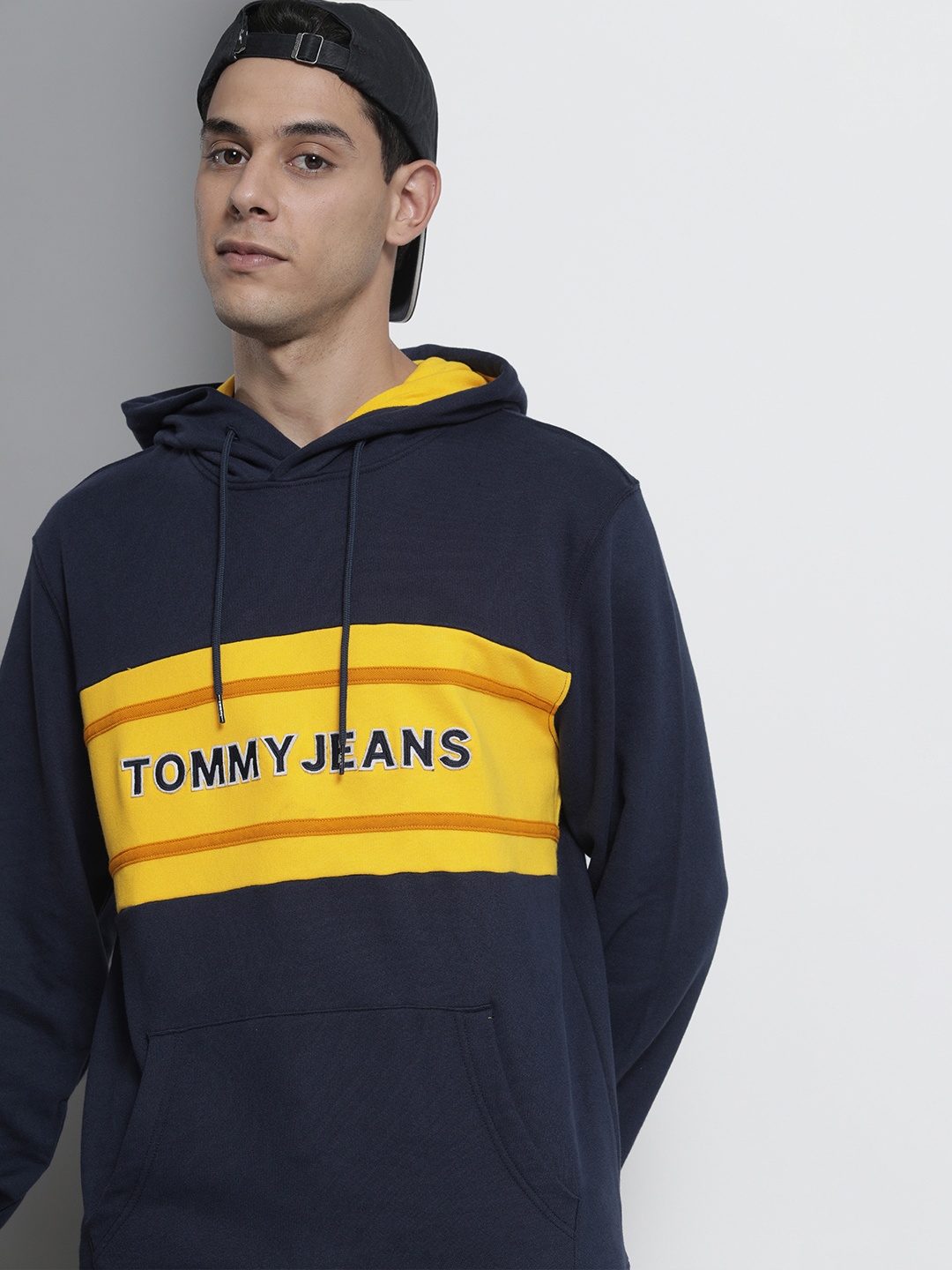 Tommy Hilfiger Men Navy Blue & Yellow Colourblocked Organic Cotton Hooded Sweatshirt
Tommy Hilfiger Men Navy Blue & Yellow Colourblocked Organic Cotton Hooded Sweatshirt