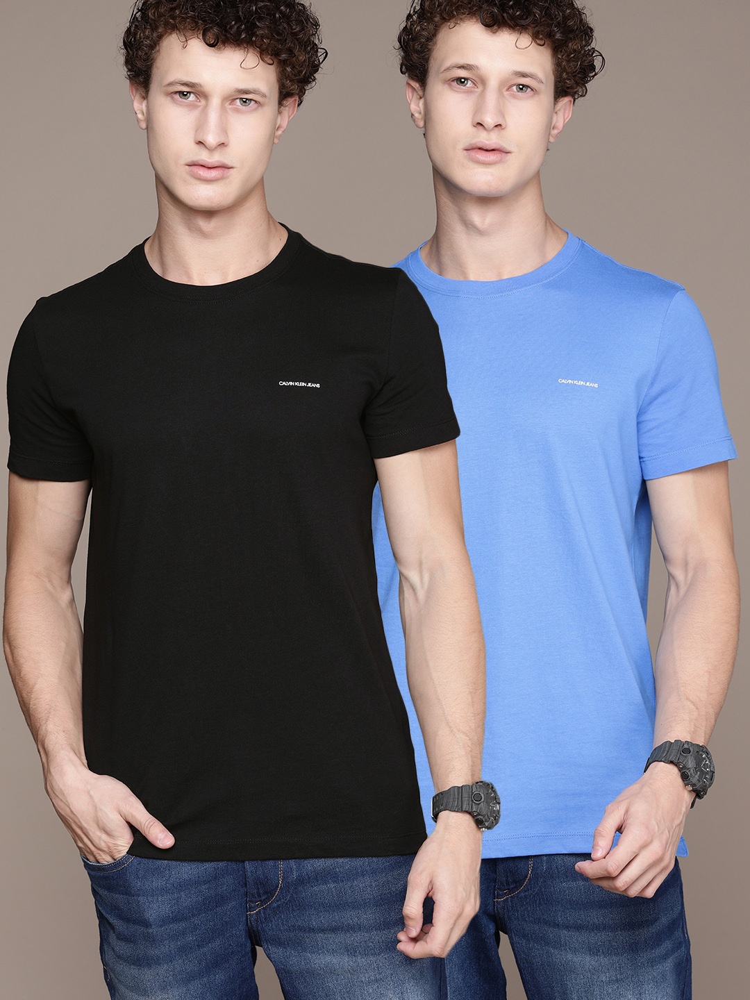 Calvin Klein Jeans Men Pack of 2 Brand Logo Organic Cotton Slim Fit Organic Cotton T-shirts, Blue
Calvin Klein Jeans Men Pack of 2 Brand Logo Organic Cotton Slim Fit Organic Cotton T-shirts, Blue