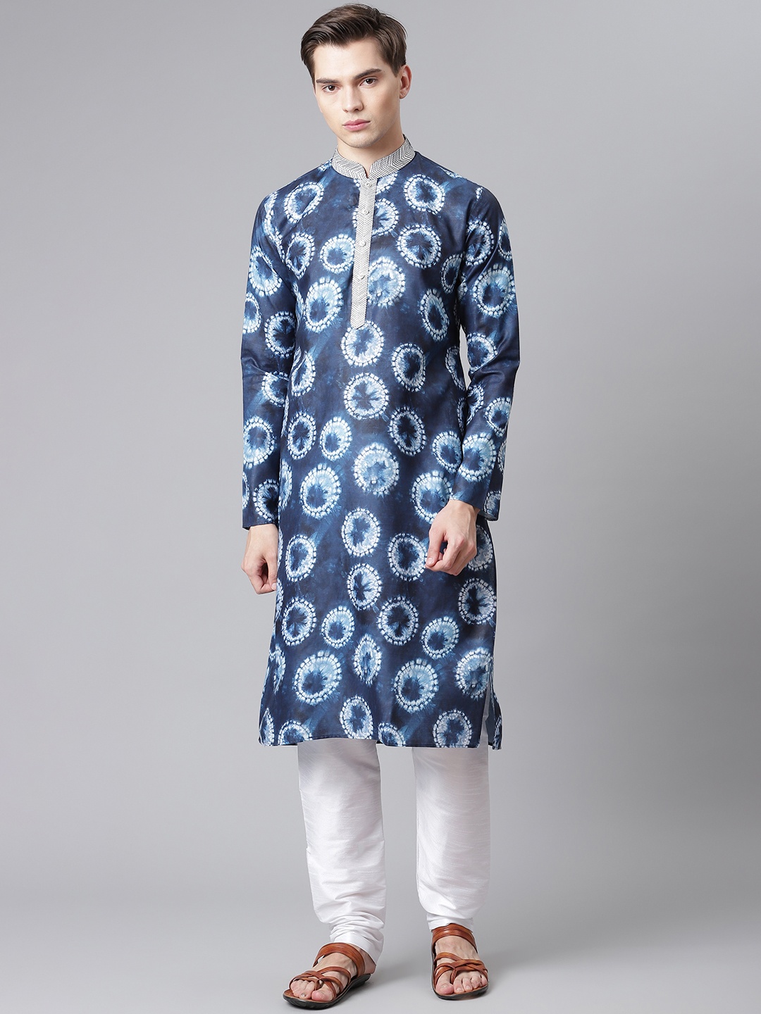 Readiprint Fashions Men Blue & White Cotton Dyed Batik Thread Work Kurta with Churidar
Readiprint Fashions Men Blue & White Cotton Dyed Batik Thread Work Kurta with Churidar