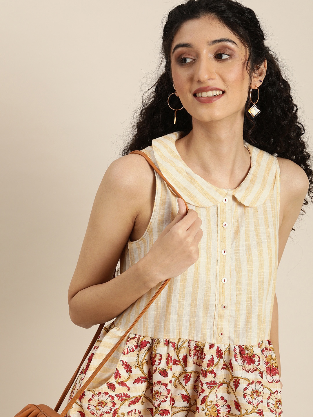 Taavi Beige & Red Sanganeri Folk Print A-Line Midi Sustainable Dress with Peter Pan Collar
Taavi Beige & Red Sanganeri Folk Print A-Line Midi Sustainable Dress with Peter Pan Collar