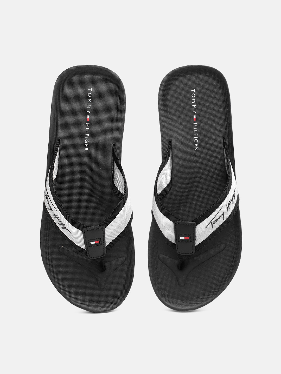 Tommy Hilfiger Men White & Grey BEACH Printed Thong Flip-Flops
Tommy Hilfiger Men White & Grey BEACH Printed Thong Flip-Flops