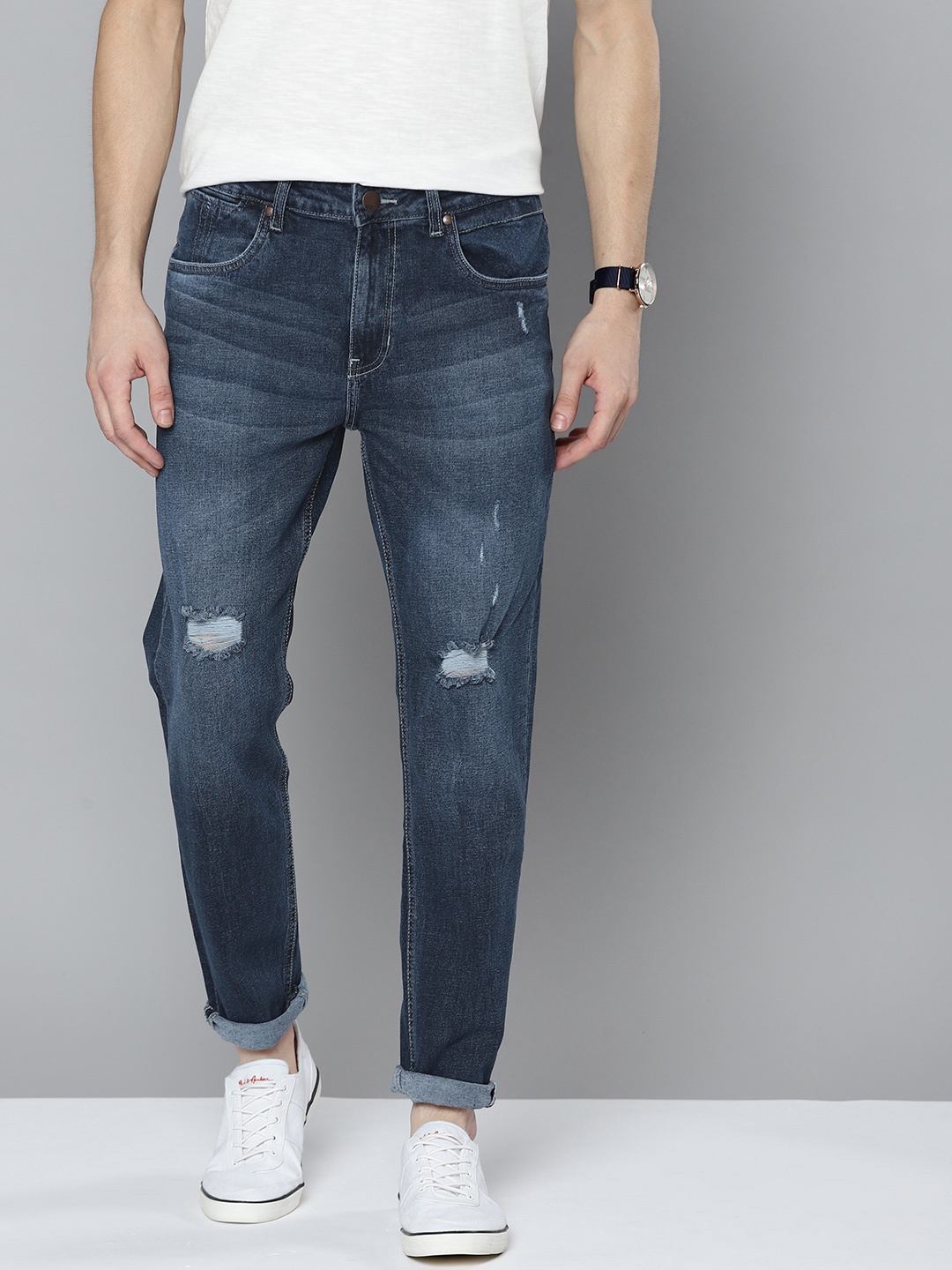Mast & Harbour Men Navy Blue Carrot Fit Mildly Distressed Light Fade Stretchable Jeans
Mast & Harbour Men Navy Blue Carrot Fit Mildly Distressed Light Fade Stretchable Jeans