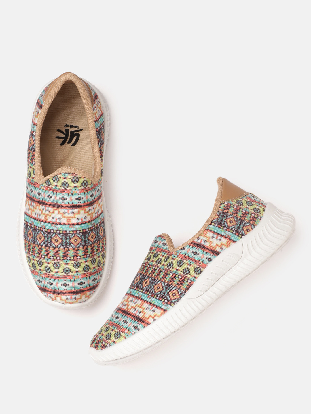 YK Girls Beige & Orange Aztec Printed Slip-On Sneakers 
YK Girls Beige & Orange Aztec Printed Slip-On Sneakers