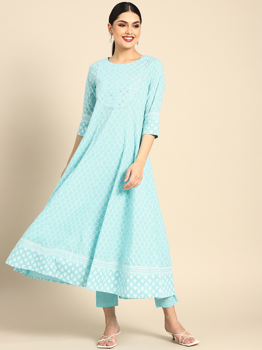 Anouk Women Blue & White Motifs Print Panelled Sequinned Pure Cotton Kurta with Trousers
Anouk Women Blue & White Motifs Print Panelled Sequinned Pure Cotton Kurta with Trousers