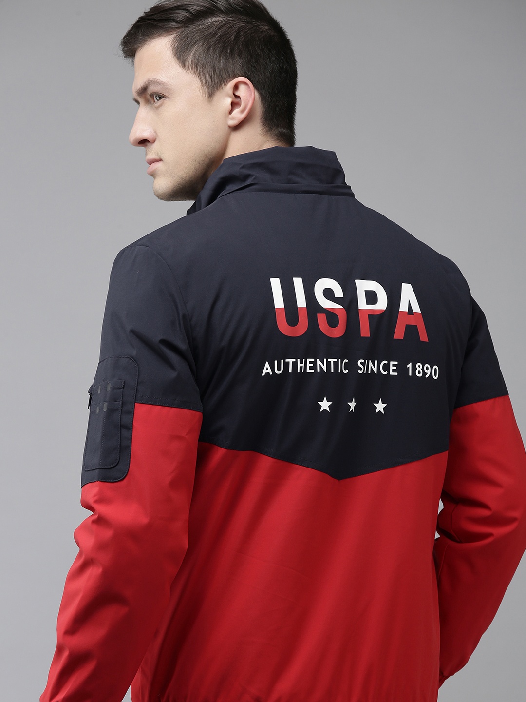 U S Polo Assn Men Navy Blue & Red Colourblocked Bomber Jacket with Logo Print Detailing
U S Polo Assn Men Navy Blue & Red Colourblocked Bomber Jacket with Logo Print Detailing