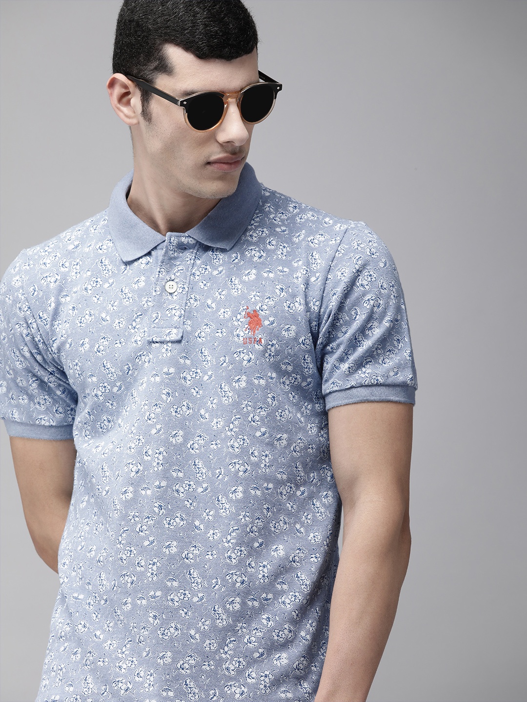 U S Polo Assn Men Blue & White Ditsy Floral Printed Polo Collar Slim Fit Cotton T-shirt
U S Polo Assn Men Blue & White Ditsy Floral Printed Polo Collar Slim Fit Cotton T-shirt