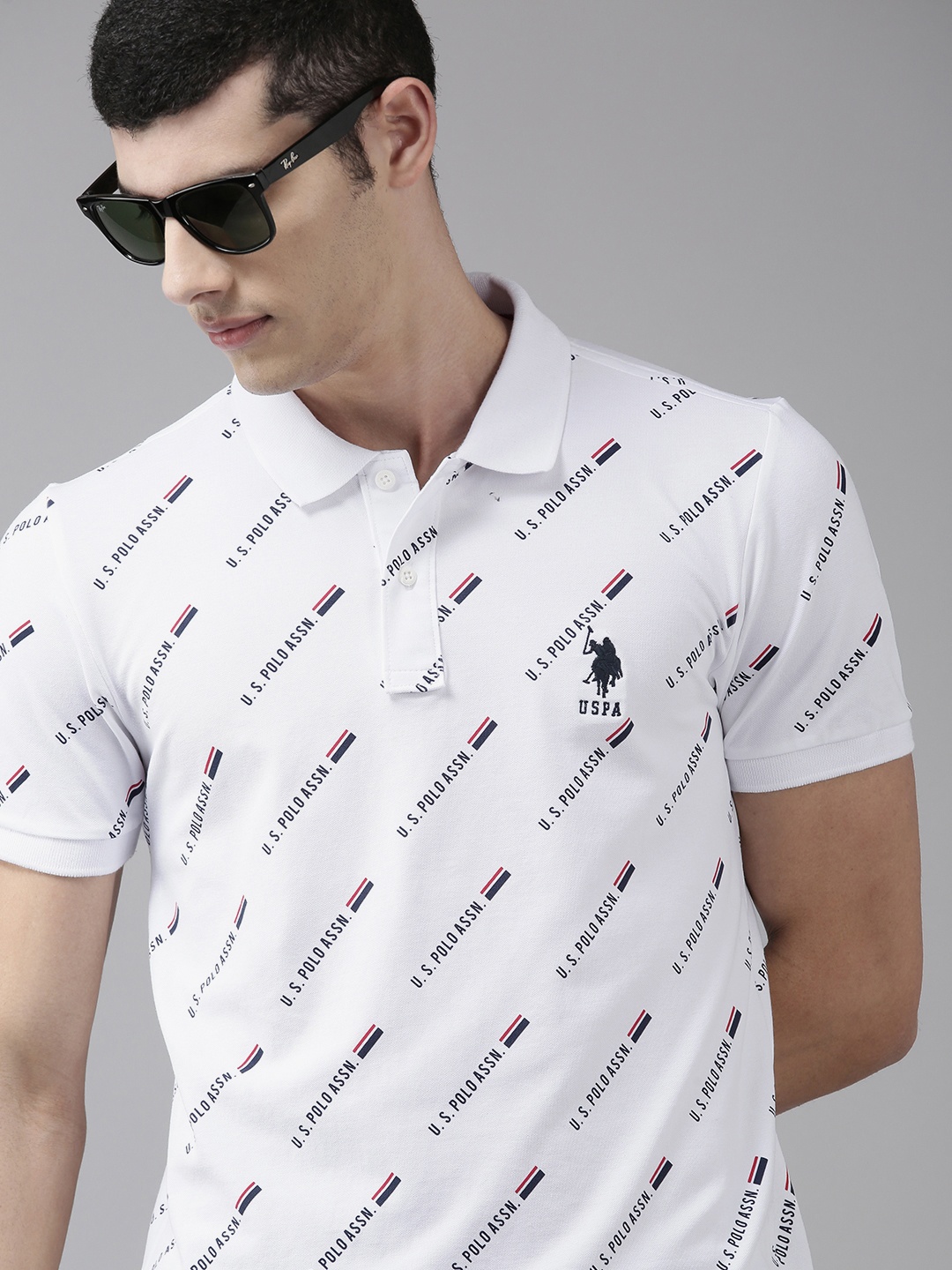 U S Polo Assn Men White & Navy Blue Brand Logo Printed Polo Collar Slim Fit T-shirt
U S Polo Assn Men White & Navy Blue Brand Logo Printed Polo Collar Slim Fit T-shirt