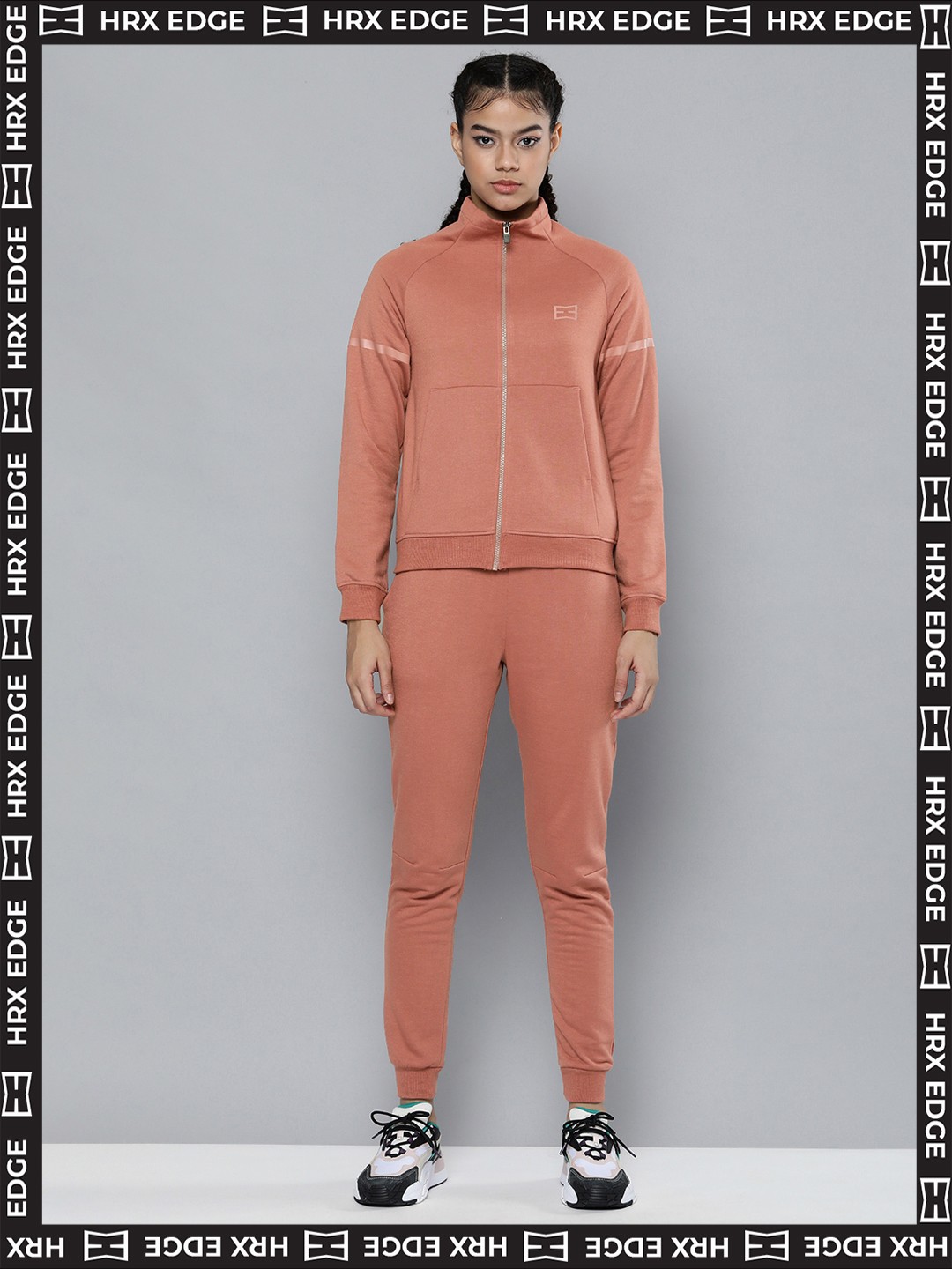HRX By Hrithik Roshan EDGE Lifestyle Women Morikau Rapid-Dry Solid Tracksuits, Peach
HRX By Hrithik Roshan EDGE Lifestyle Women Morikau Rapid-Dry Solid Tracksuits, Peach