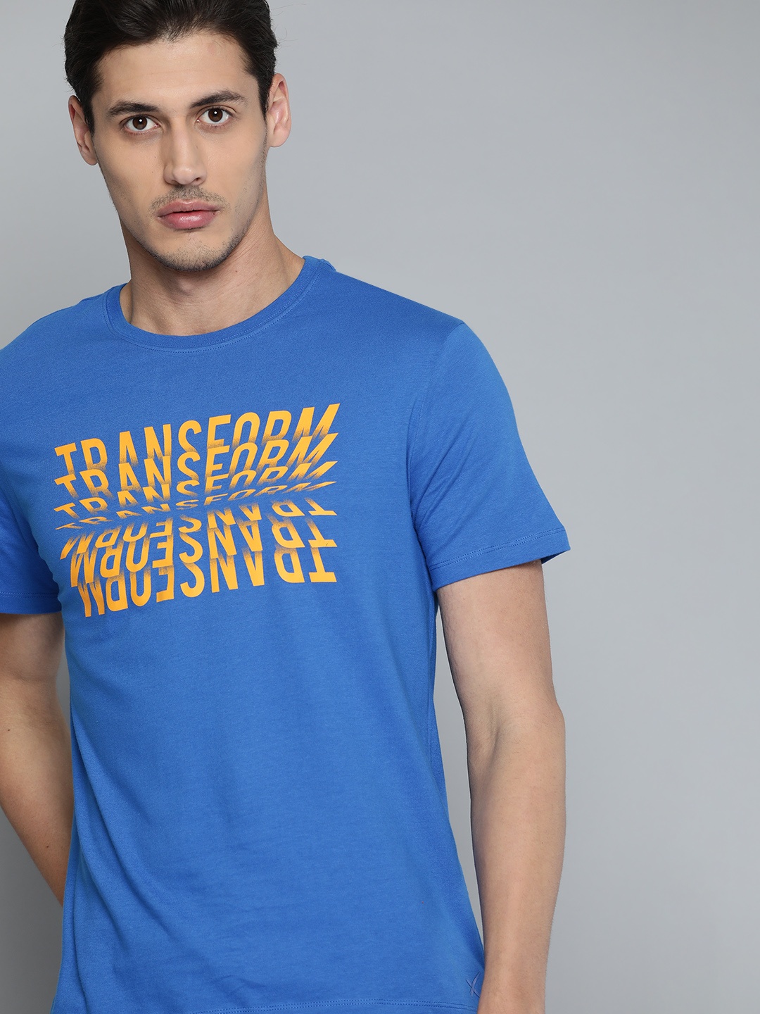 HRX by Hrithik Roshan Men Blue & Mustard Yellow Typography Printed Pure Cotton T-shirt
HRX by Hrithik Roshan Men Blue & Mustard Yellow Typography Printed Pure Cotton T-shirt