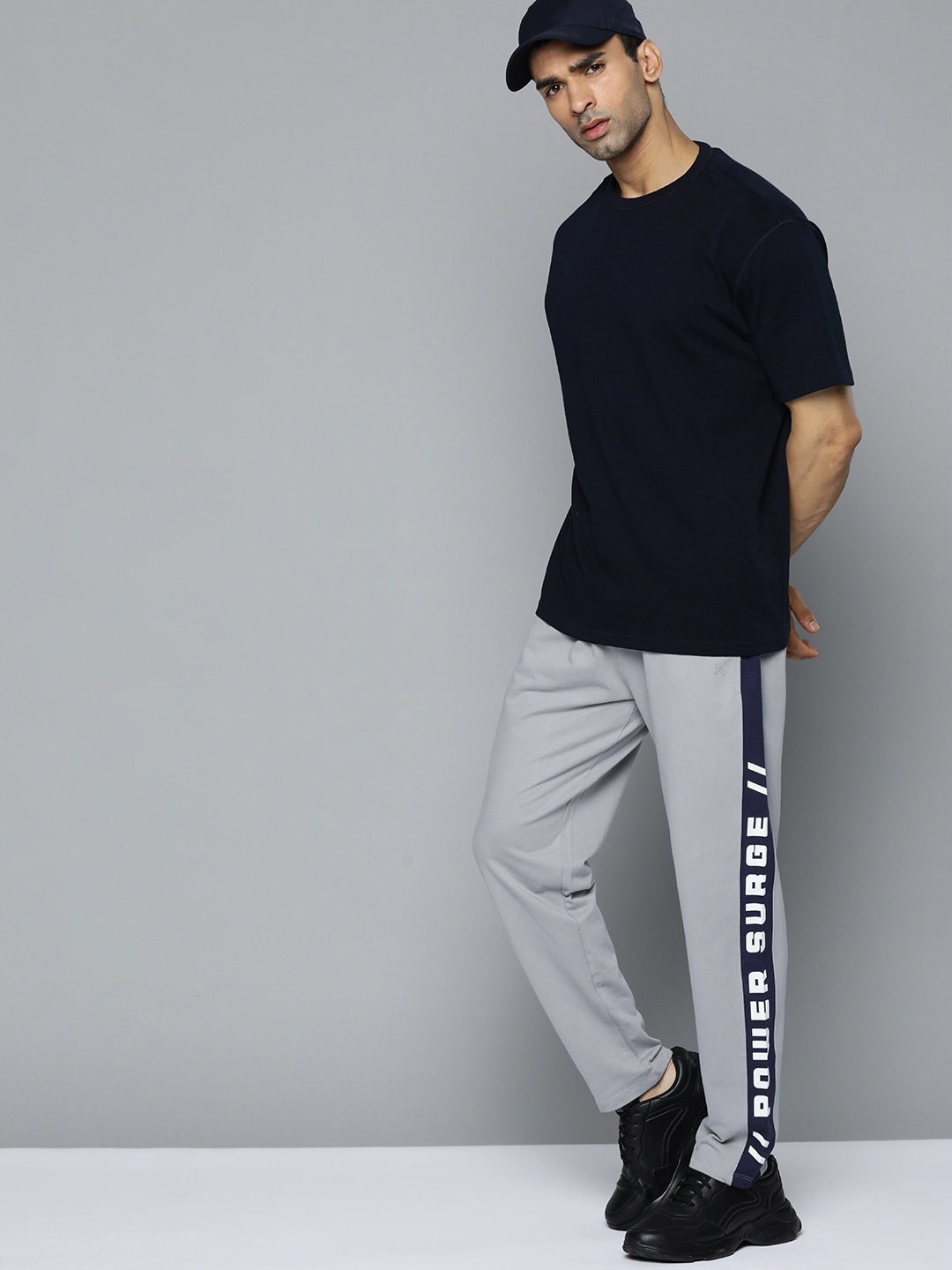 HRX by Hrithik Roshan Lifestyle Men Wet Weather Bio-Wash Typography Track Pants, Grey melange
HRX by Hrithik Roshan Lifestyle Men Wet Weather Bio-Wash Typography Track Pants, Grey melange