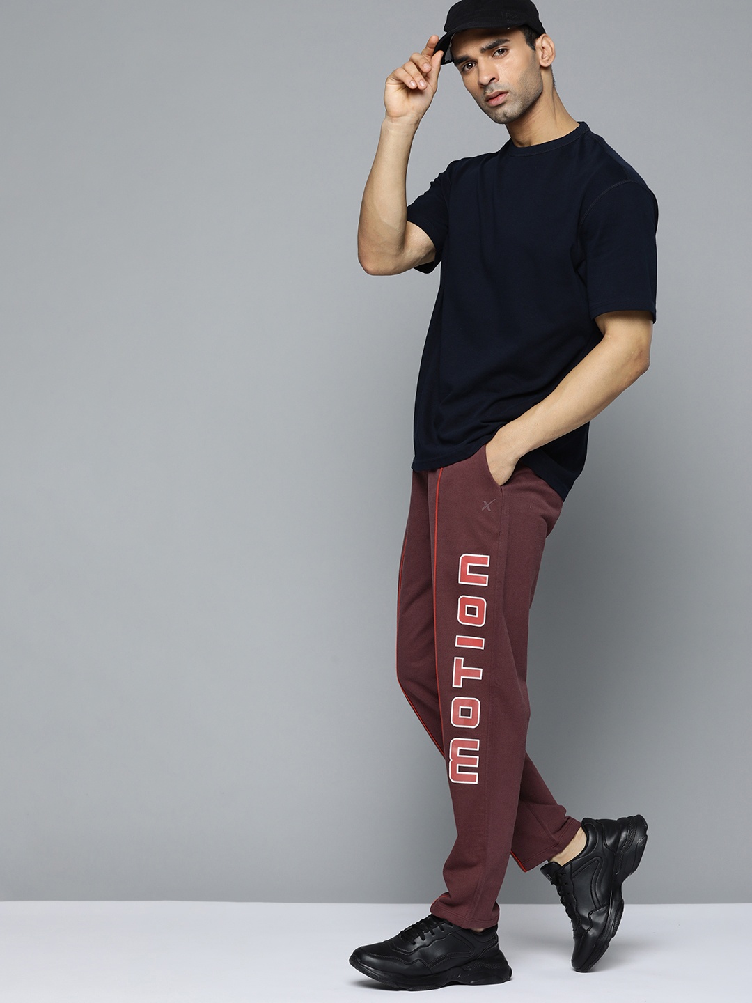 HRX by Hrithik Roshan Lifestyle Men Port Royale Bio-Wash Typography Track Pants, Burgundy
HRX by Hrithik Roshan Lifestyle Men Port Royale Bio-Wash Typography Track Pants, Burgundy