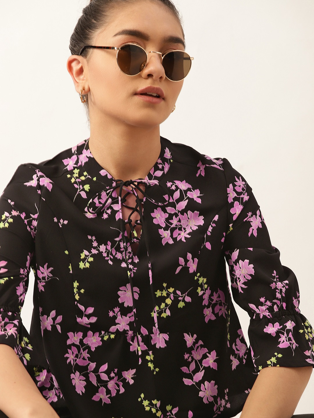 DressBerry Black & Purple Floral Tie-Up Neck Regular Top
DressBerry Black & Purple Floral Tie-Up Neck Regular Top