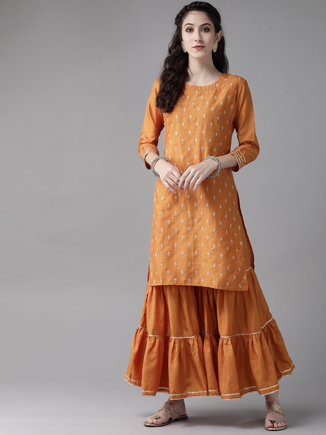 Indo Era Women Mustard Yellow Ethnic Motifs Embroidered Gotta Patti Kurta with Sharara
Indo Era Women Mustard Yellow Ethnic Motifs Embroidered Gotta Patti Kurta with Sharara