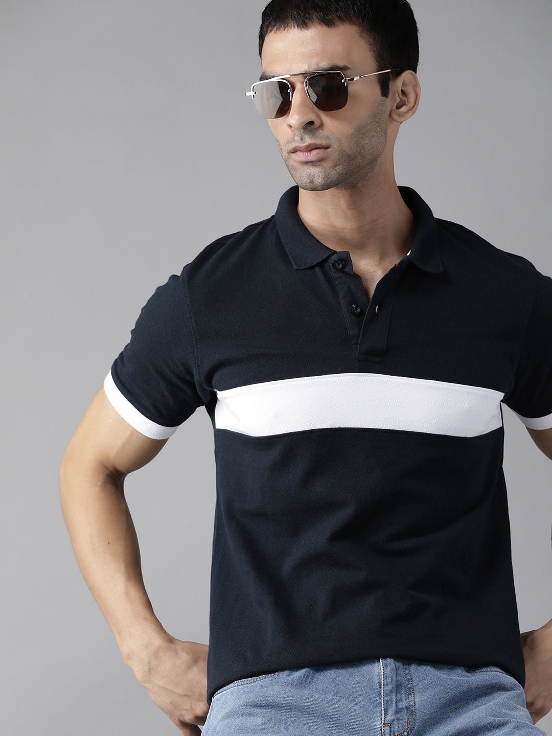 Roadster Men Navy Blue & White Pure Cotton Polo Collar T-shirt with Contrast Panelling
Roadster Men Navy Blue & White Pure Cotton Polo Collar T-shirt with Contrast Panelling
