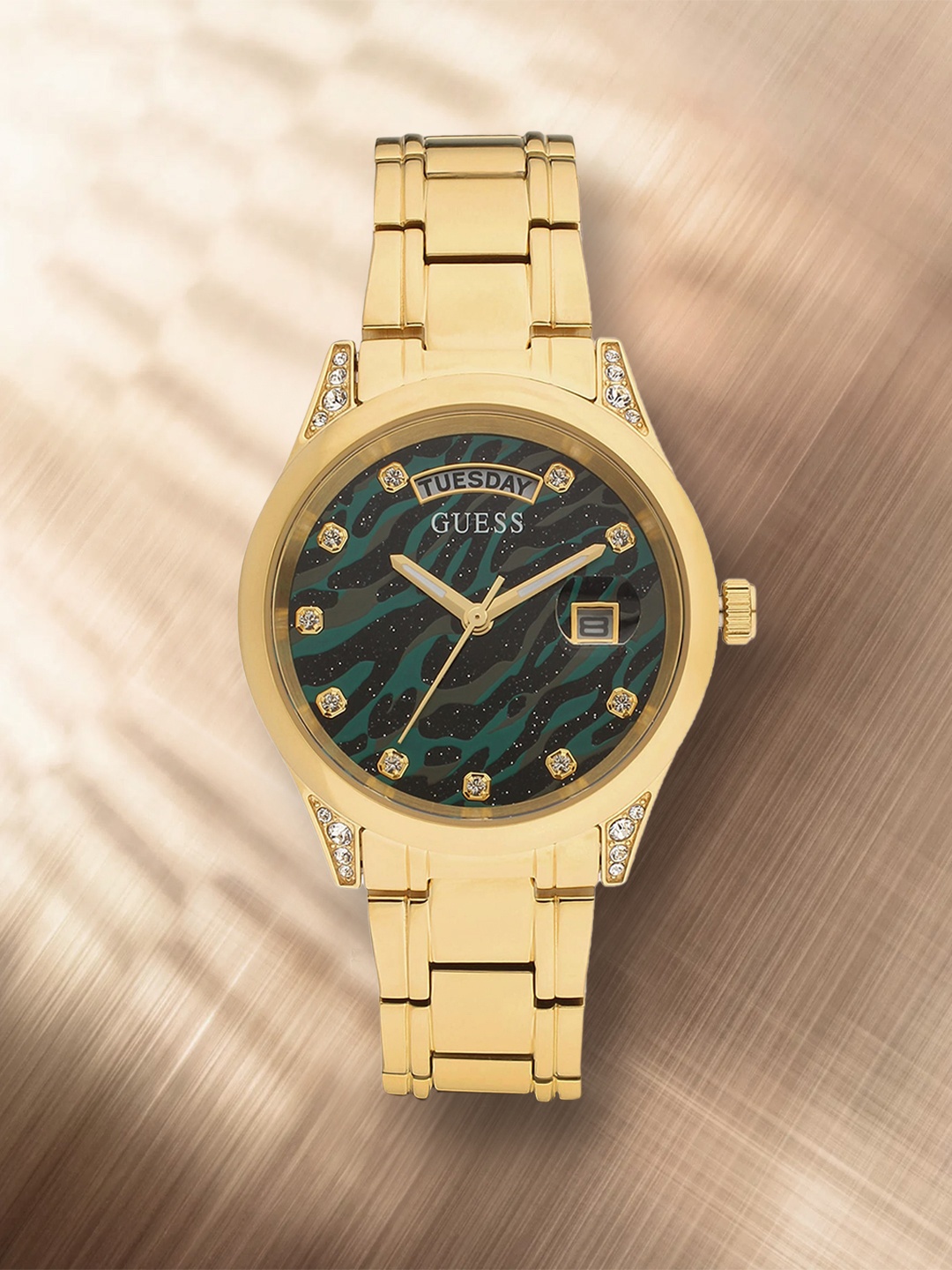 GUESS Women Gold-Toned Printed Dial & Gold Toned Bracelet Style Strap Analogue Watch
GUESS Women Gold-Toned Printed Dial & Gold Toned Bracelet Style Strap Analogue Watch