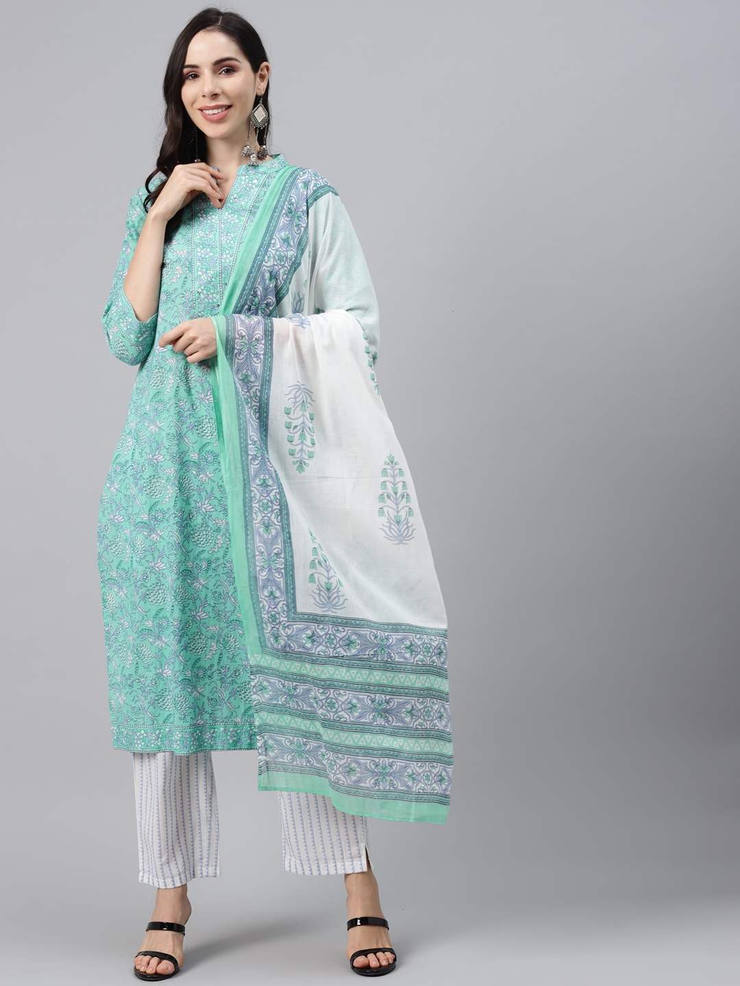Silai Bunai Women Green Floral Printed Sequinned Pure Cotton Kurta with Trousers & With Dupatta
Silai Bunai Women Green Floral Printed Sequinned Pure Cotton Kurta with Trousers & With Dupatta