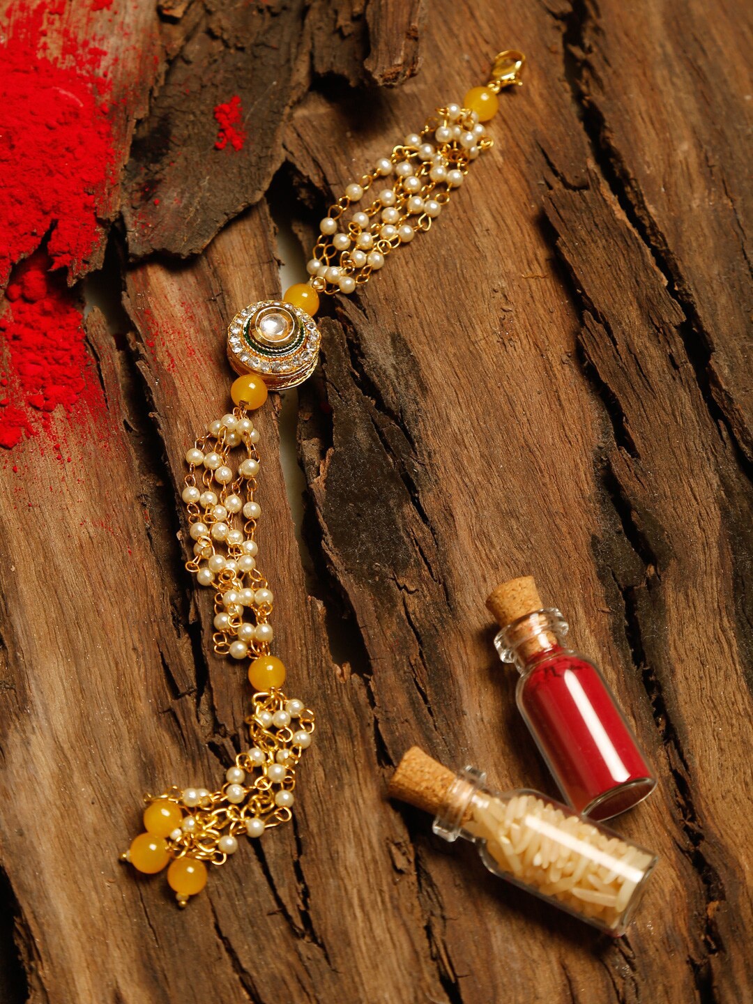 Ruby Raang Yellow & Gold Kundan Beaded Rakhi Gift Box With Roli, Chawal & Greeting Card
Ruby Raang Yellow & Gold Kundan Beaded Rakhi Gift Box With Roli, Chawal & Greeting Card
