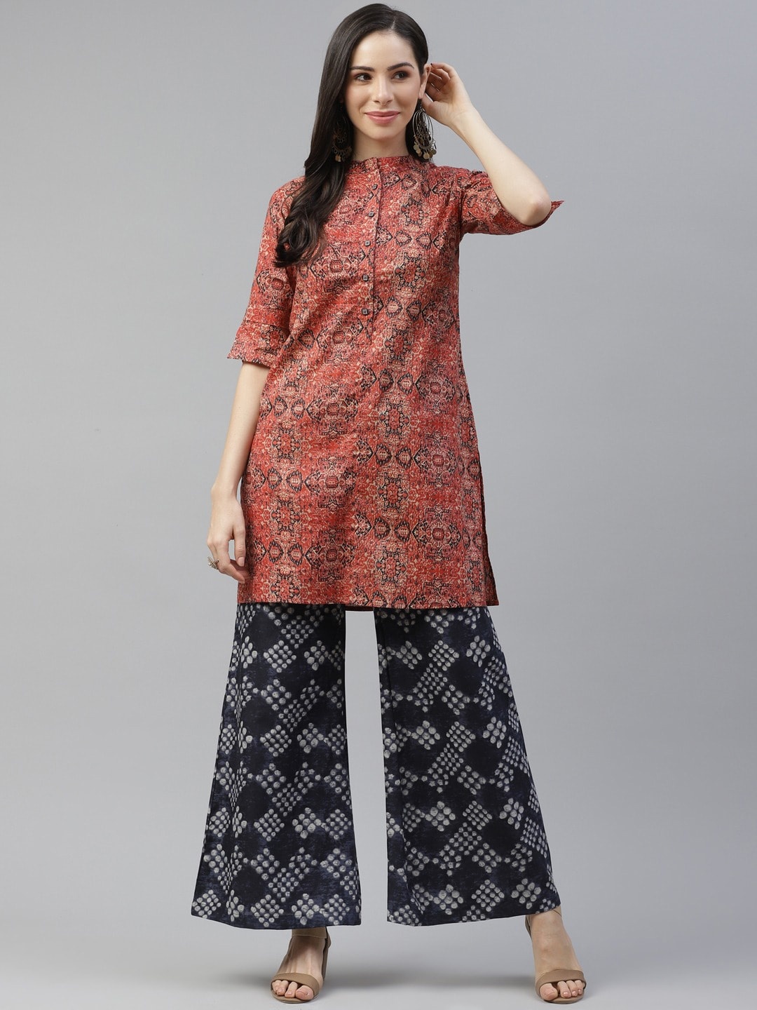 Cottinfab Women Orange Ethnic Motifs Printed Panelled Pure Cotton Kurta with Palazzos
Cottinfab Women Orange Ethnic Motifs Printed Panelled Pure Cotton Kurta with Palazzos