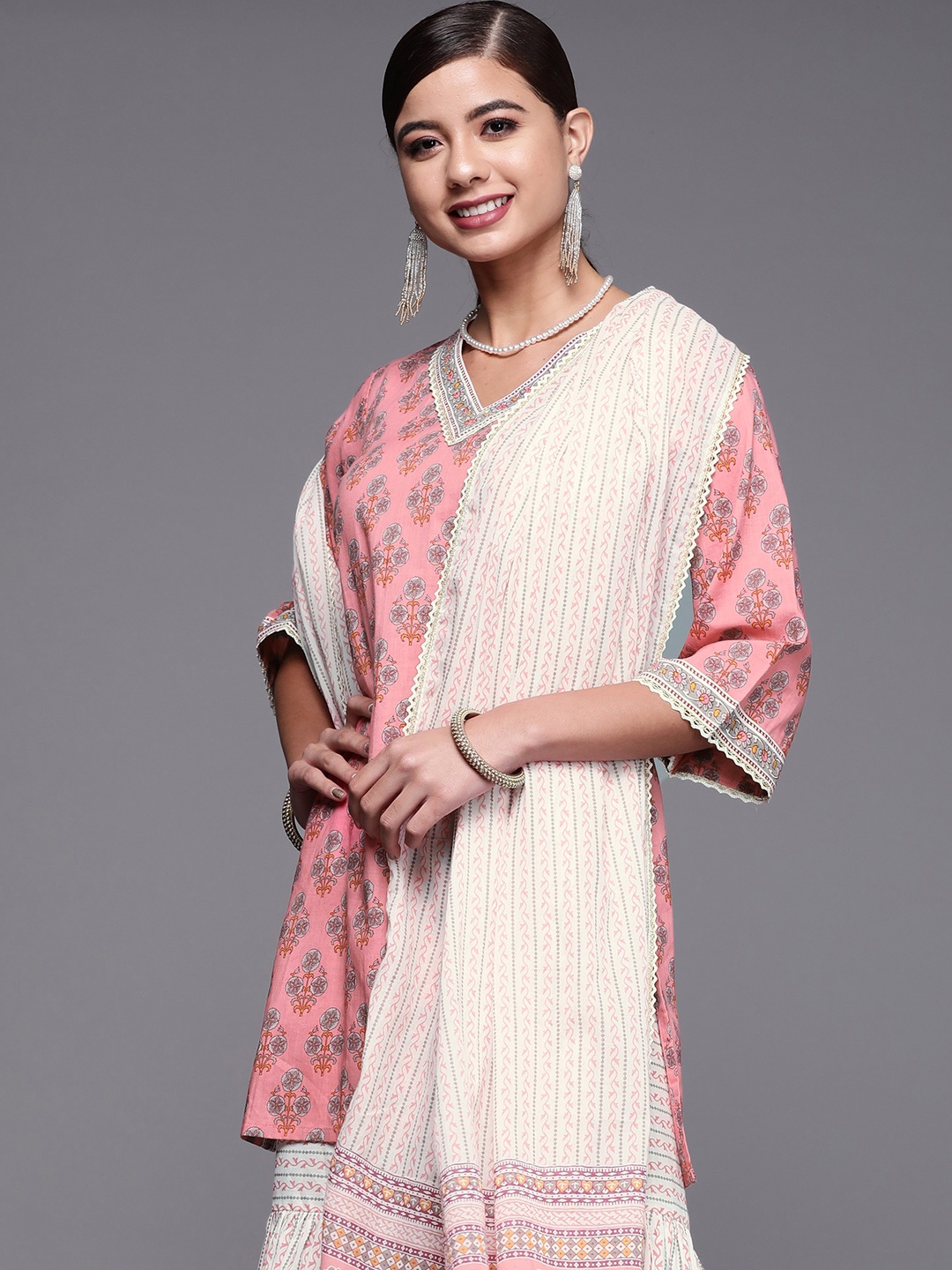 Libas Women Coral Pink & White Printed Pure Cotton Kurta with Sharara & With Dupatta
Libas Women Coral Pink & White Printed Pure Cotton Kurta with Sharara & With Dupatta