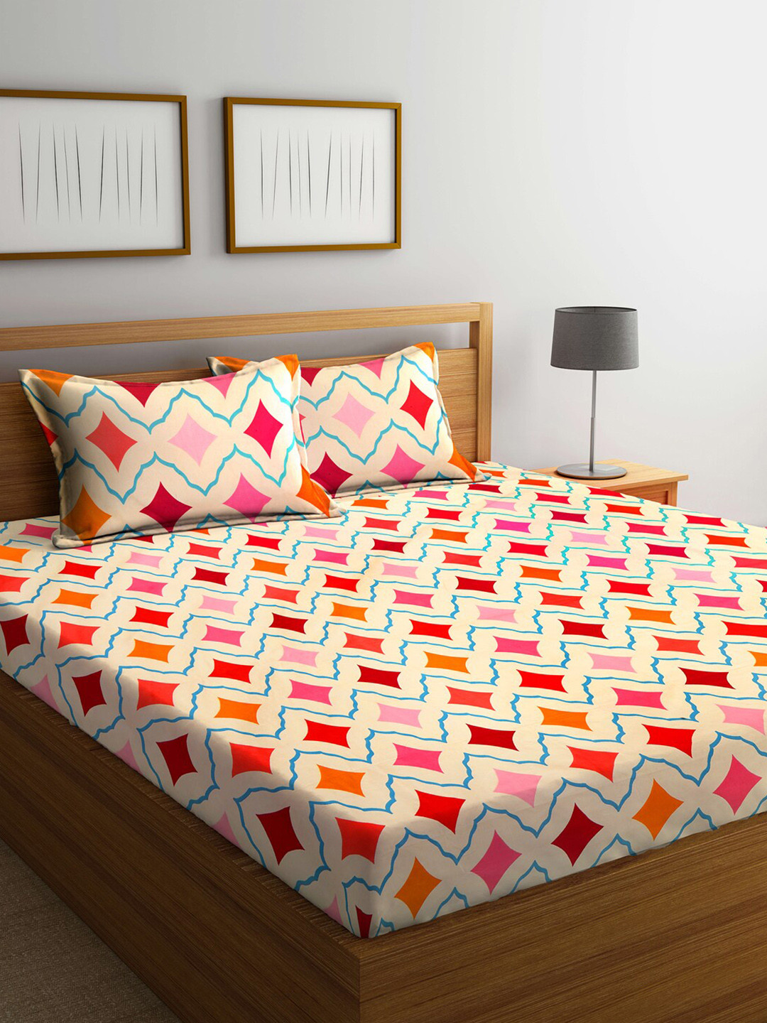 KLOTTHE Pink & Yellow Geometric 210 TC Polycotton King Bedsheet with 2 Pillow Covers, Beige 
KLOTTHE Pink & Yellow Geometric 210 TC Polycotton King Bedsheet with 2 Pillow Covers, Beige