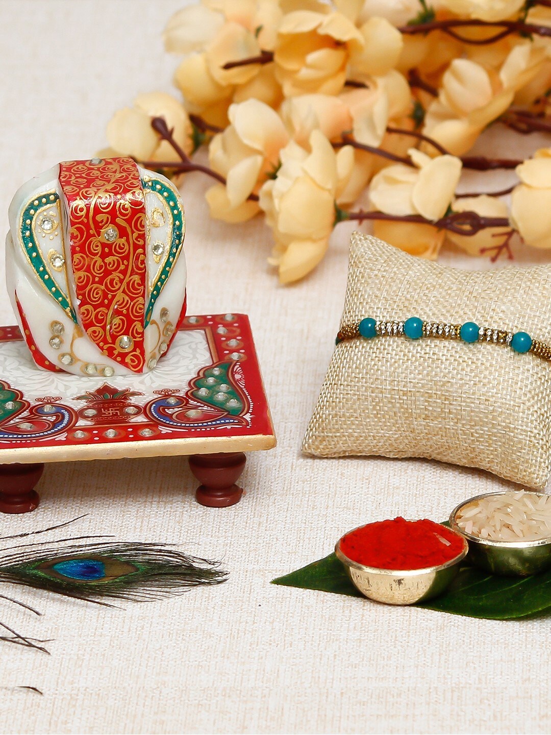 eCraftIndia Set Of 2 Rakhi With Lord Ganesha On Marble Chowki With Roli Chawal Gift Set, Blue
eCraftIndia Set Of 2 Rakhi With Lord Ganesha On Marble Chowki With Roli Chawal Gift Set, Blue