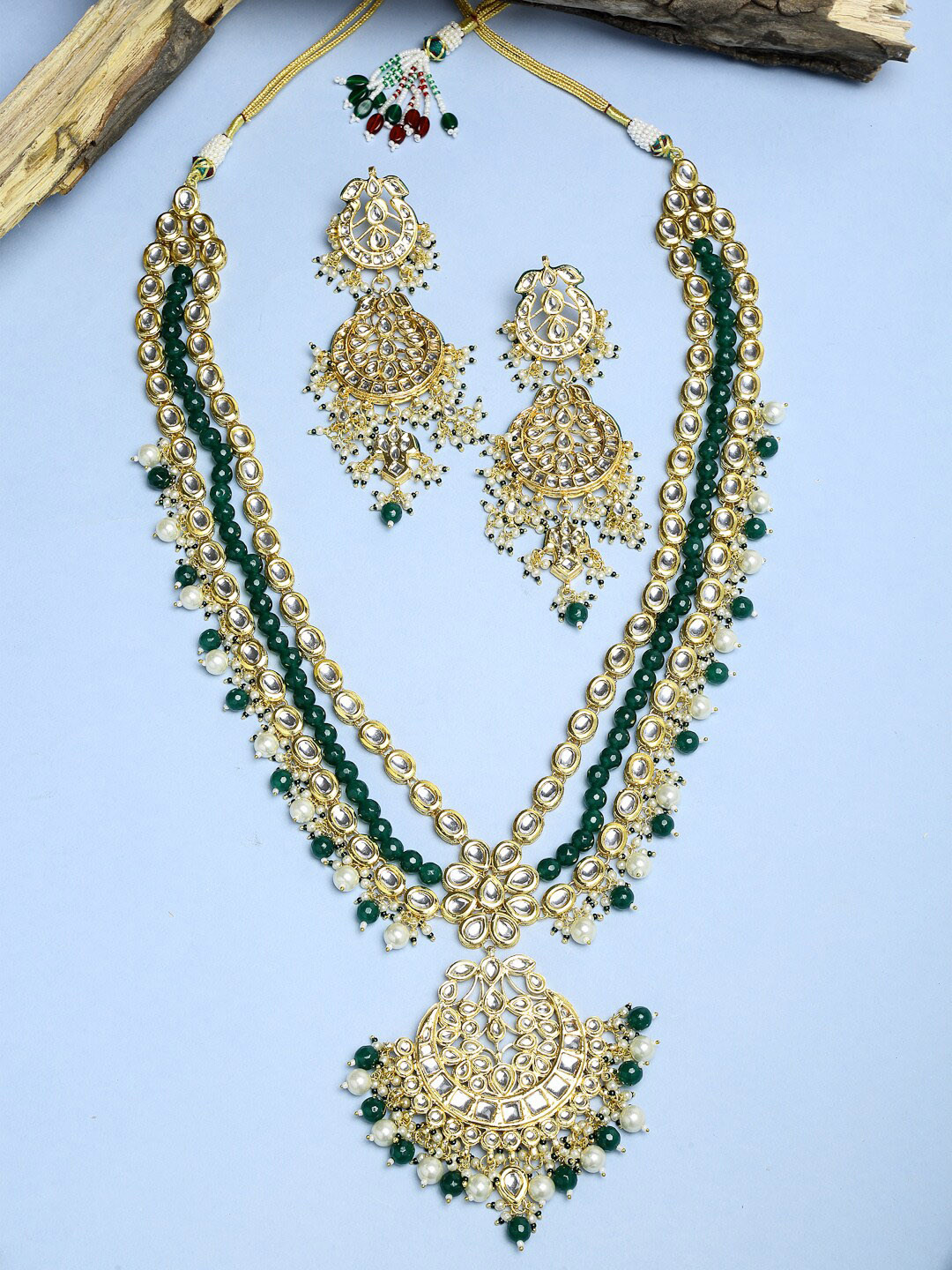 Ruby Raang Gold-Plated Green & White Faux Kundan-Studded & Faux Pearl Beaded Handcrafted Jewellery Set
Ruby Raang Gold-Plated Green & White Faux Kundan-Studded & Faux Pearl Beaded Handcrafted Jewellery Set