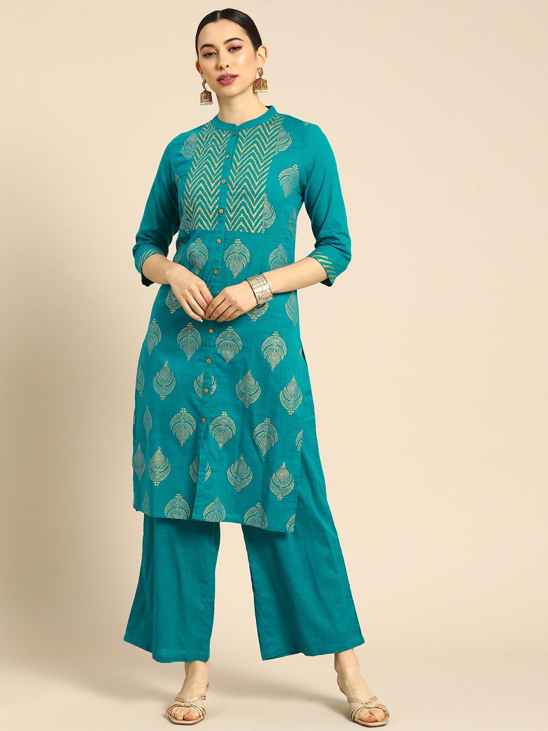 Anouk Women Turquoise Blue Ethnic Motifs Foil Printed Pure Cotton Kurta with Palazzos
Anouk Women Turquoise Blue Ethnic Motifs Foil Printed Pure Cotton Kurta with Palazzos