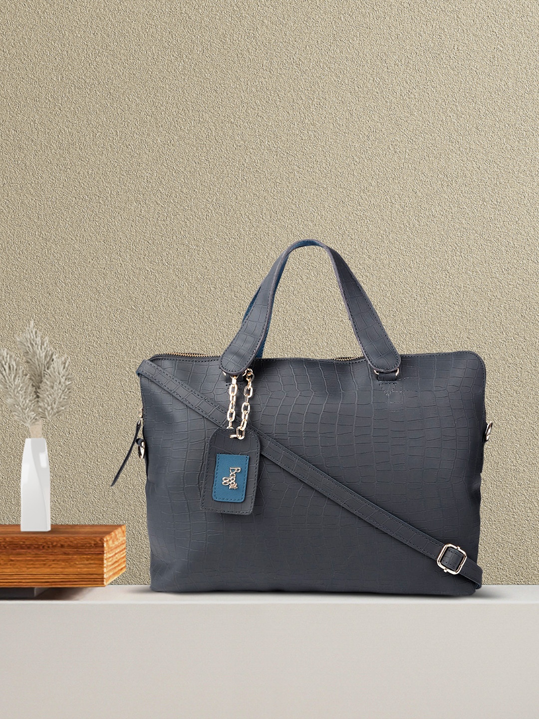Baggit Navy Blue Animal Textured Oversized Structured Laptop Sleeve Handheld Bag