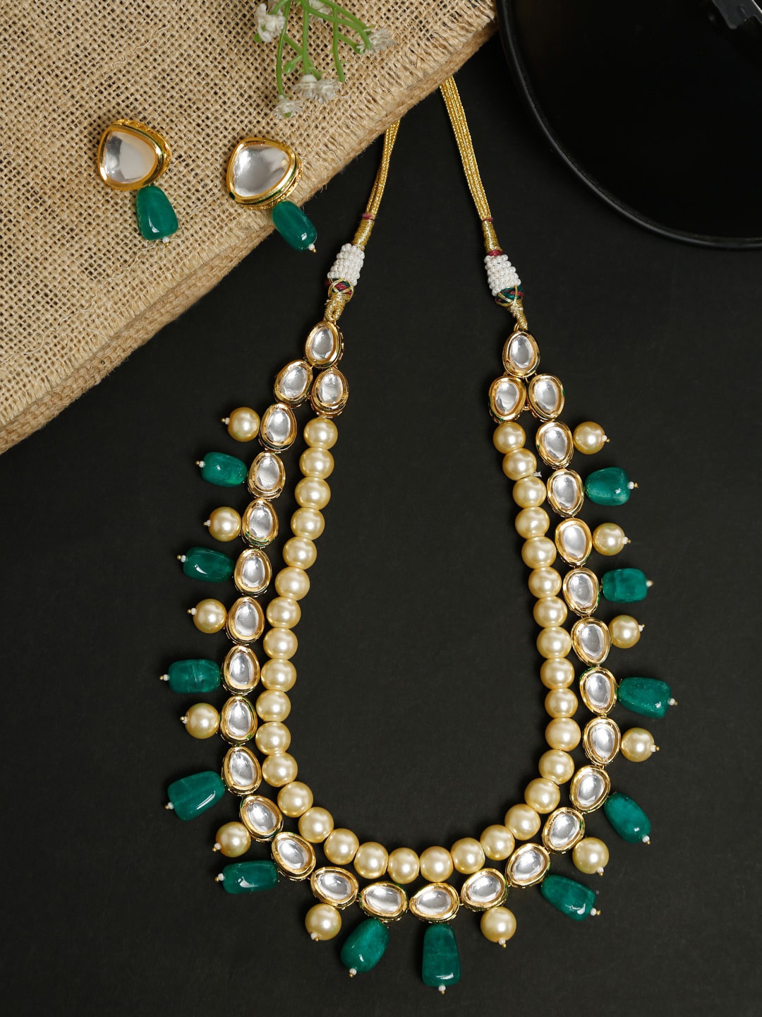 Ruby Raang Gold-Toned & White Faux Kundan-Studded & Pearl Beaded Meenakari Jewellery Set
Ruby Raang Gold-Toned & White Faux Kundan-Studded & Pearl Beaded Meenakari Jewellery Set