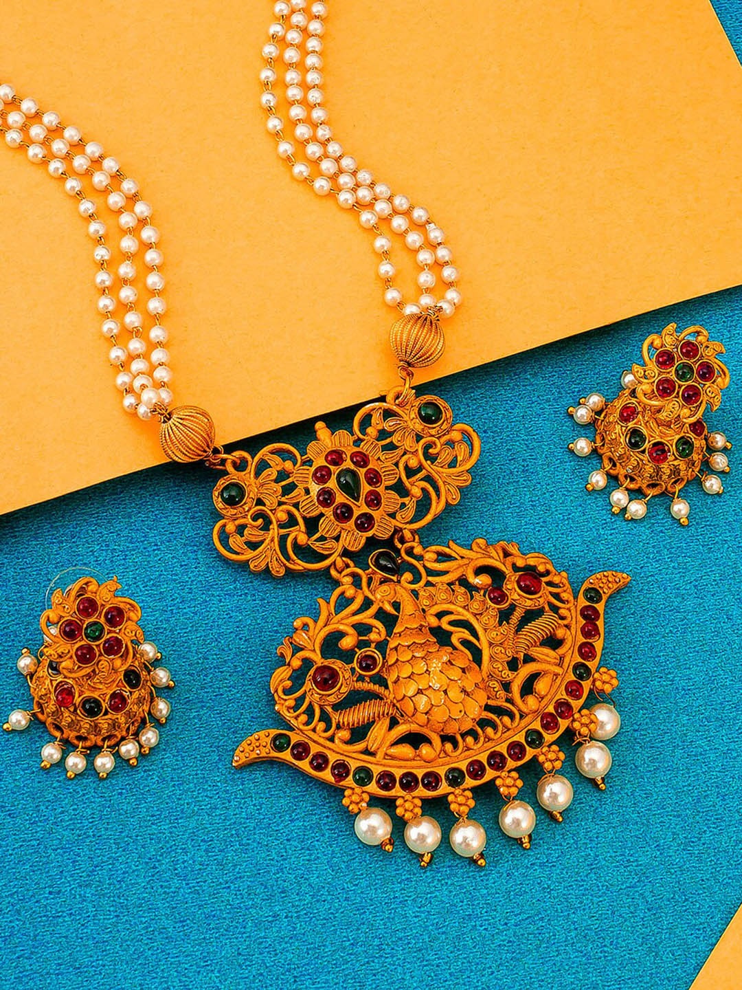 aadita Gold-Plating Magenta Pink & Off White Stone-Studded Pearl Beaded Temple Jewellery Set
aadita Gold-Plating Magenta Pink & Off White Stone-Studded Pearl Beaded Temple Jewellery Set