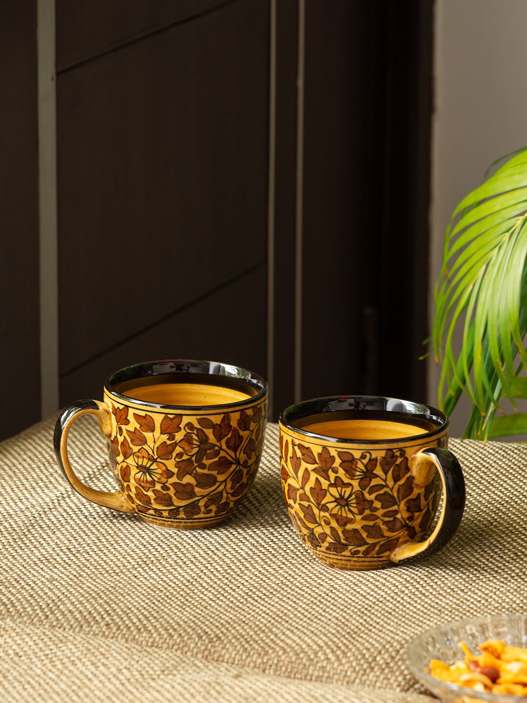 ExclusiveLane Brown & Yellow 2 Pieces Floral Printed Ceramic Glossy Coffee Mugs (280 ML)
ExclusiveLane Brown & Yellow 2 Pieces Floral Printed Ceramic Glossy Coffee Mugs (280 ML)