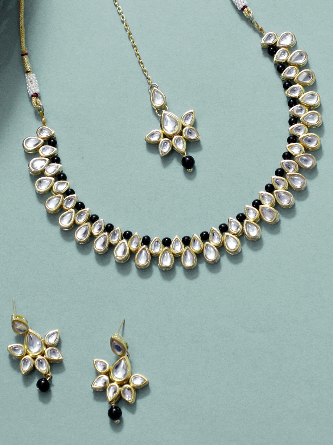 KARATCART Gold-Plated & White Kundan-Studded & Beaded Handcrafted Jewellery Set
KARATCART Gold-Plated & White Kundan-Studded & Beaded Handcrafted Jewellery Set
