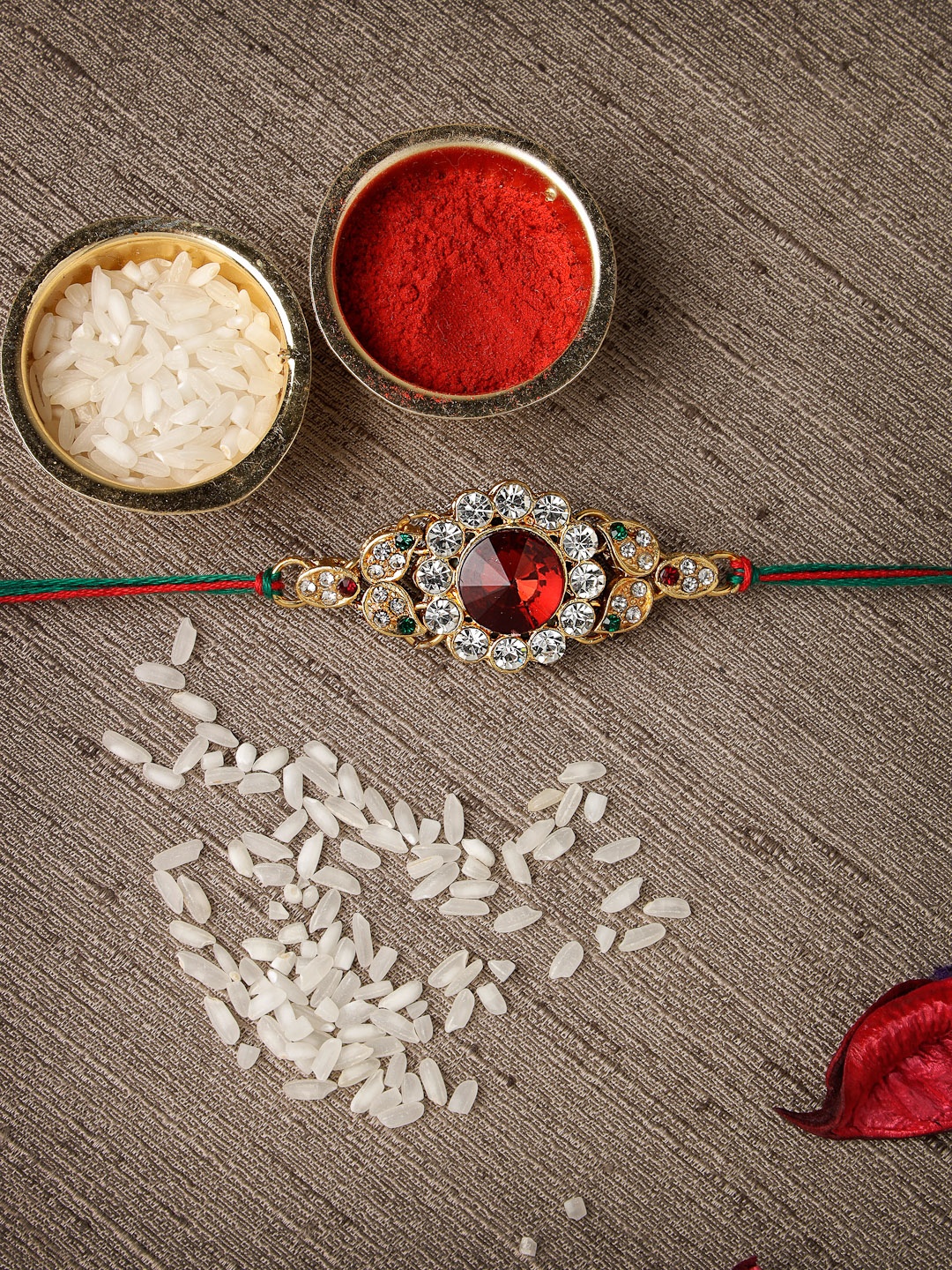 Sukkhi Rakhi Men Gold-Plated White & Red Stone-Studded Rakhi With Roli Chawal & Greeting Card
Sukkhi Rakhi Men Gold-Plated White & Red Stone-Studded Rakhi With Roli Chawal & Greeting Card