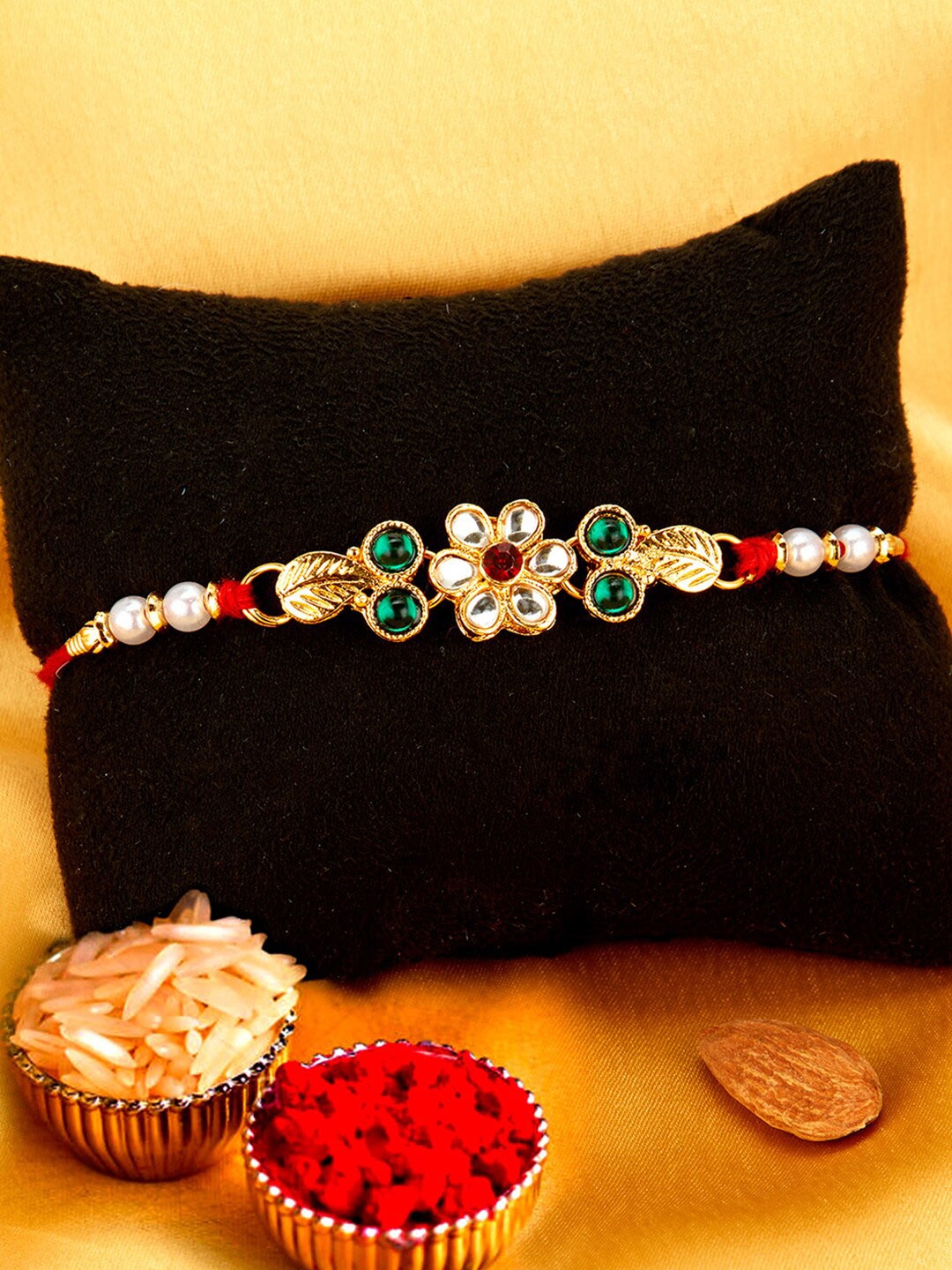 Sukkhi Rakhi Men Gold-Plated White & Green Stone-Studded & Beaded Rakhi With Roli Chawal & Greeting Card
Sukkhi Rakhi Men Gold-Plated White & Green Stone-Studded & Beaded Rakhi With Roli Chawal & Greeting Card